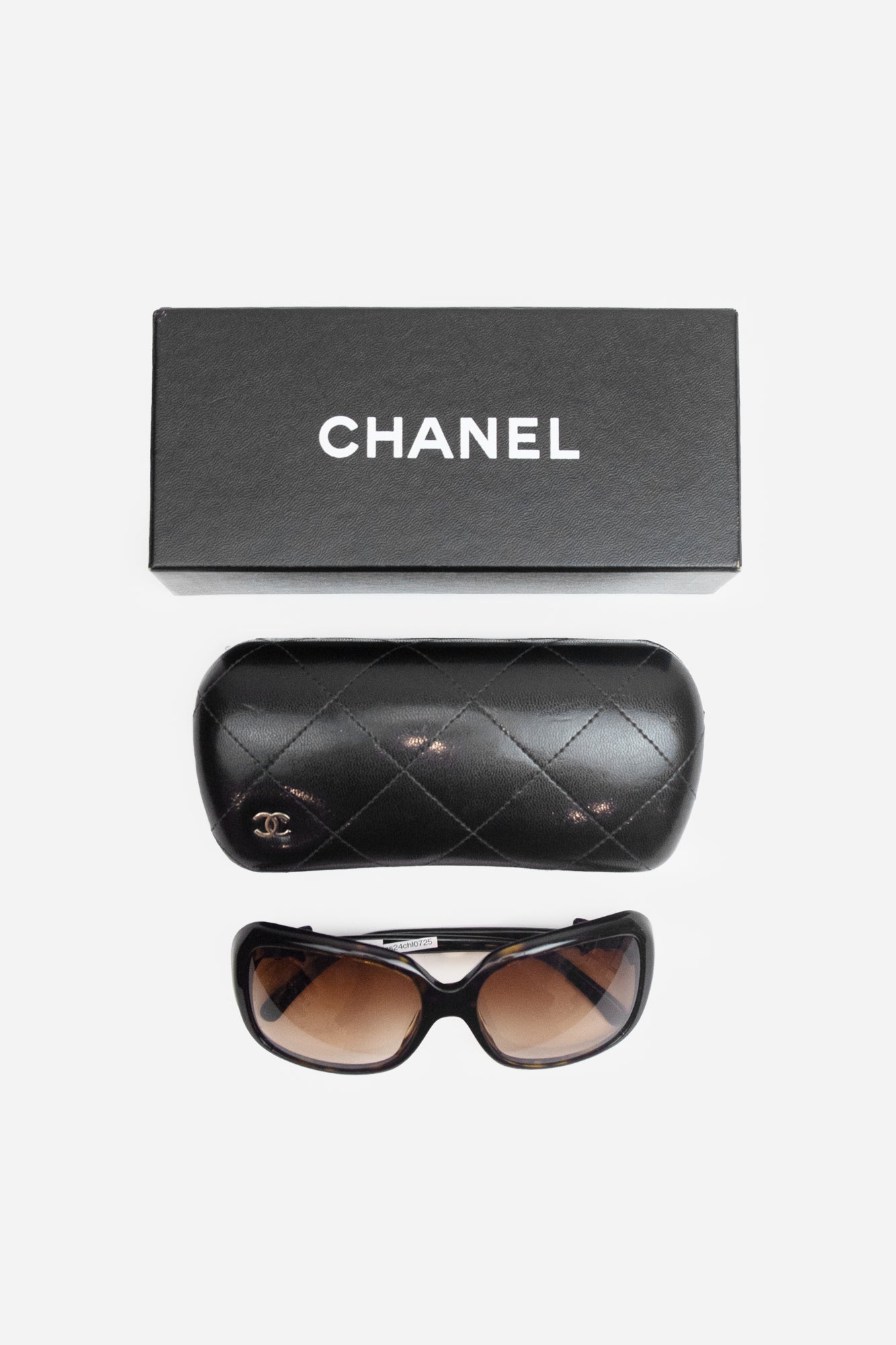 Tortoise Sunglasses With Chanel Bow On Arm
