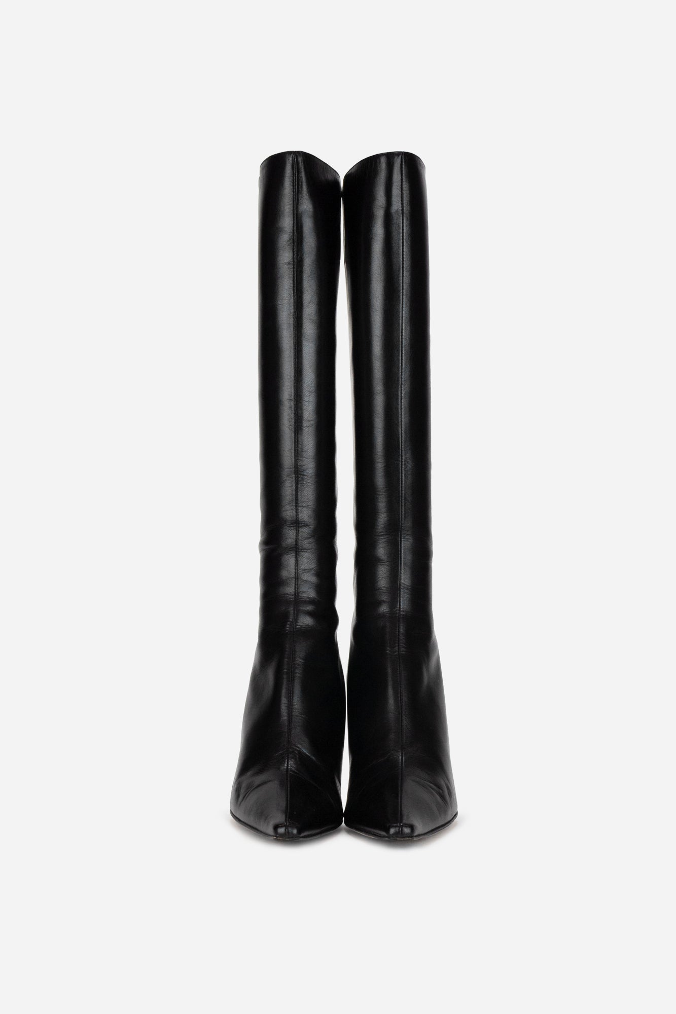 Black leather pointed toe knee high boots