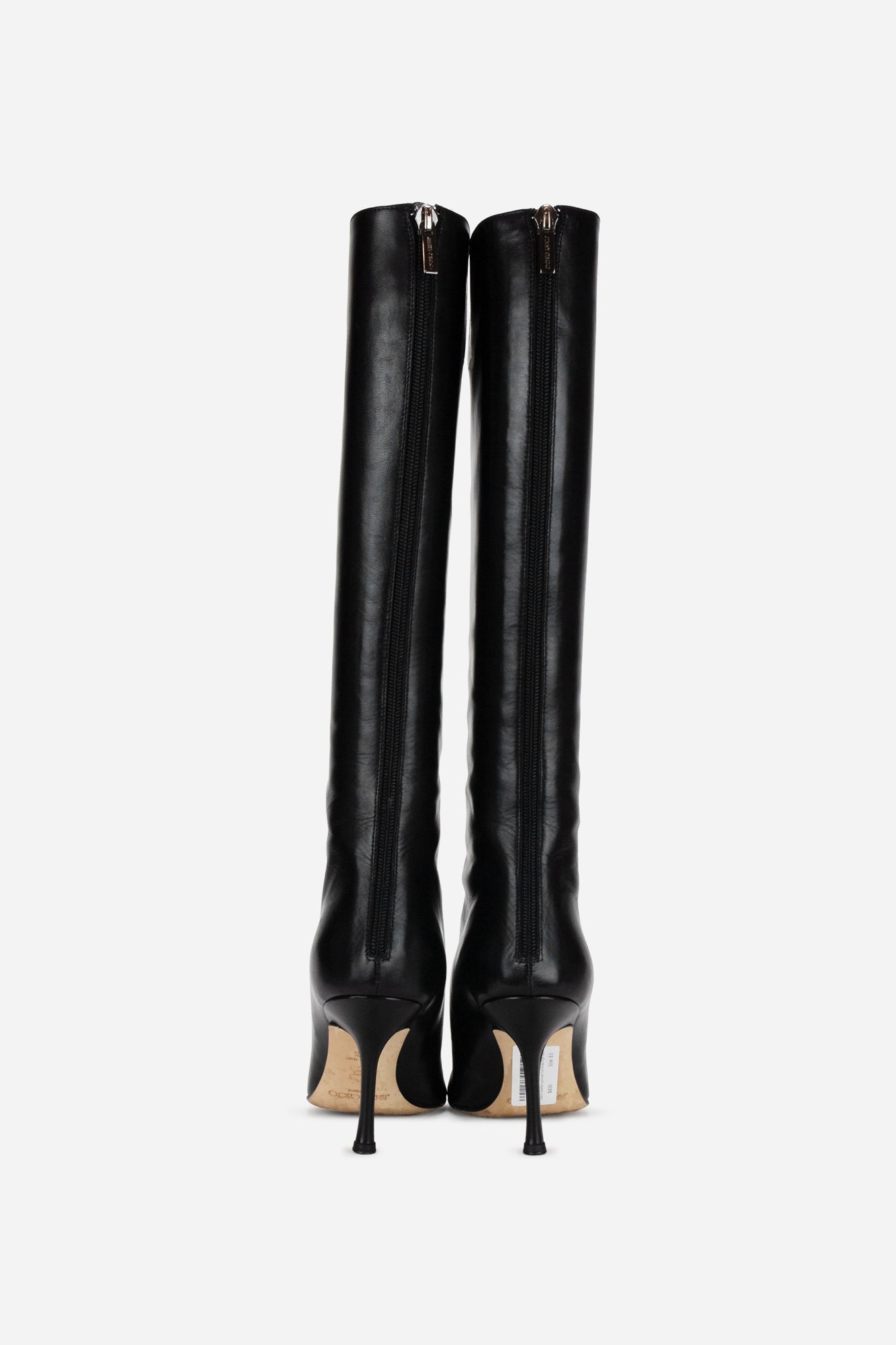 Black leather pointed toe knee high boots