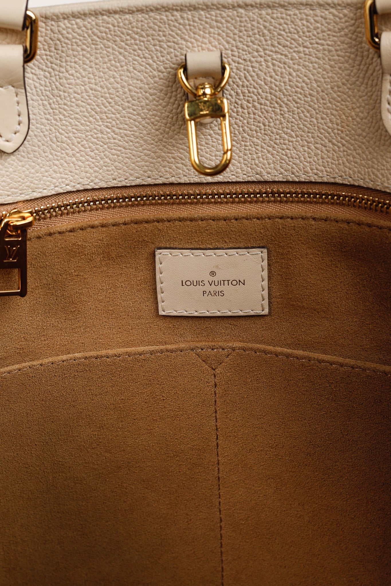 OnTheGo GM Creme Empreinte Monogram Leather Tote Bag