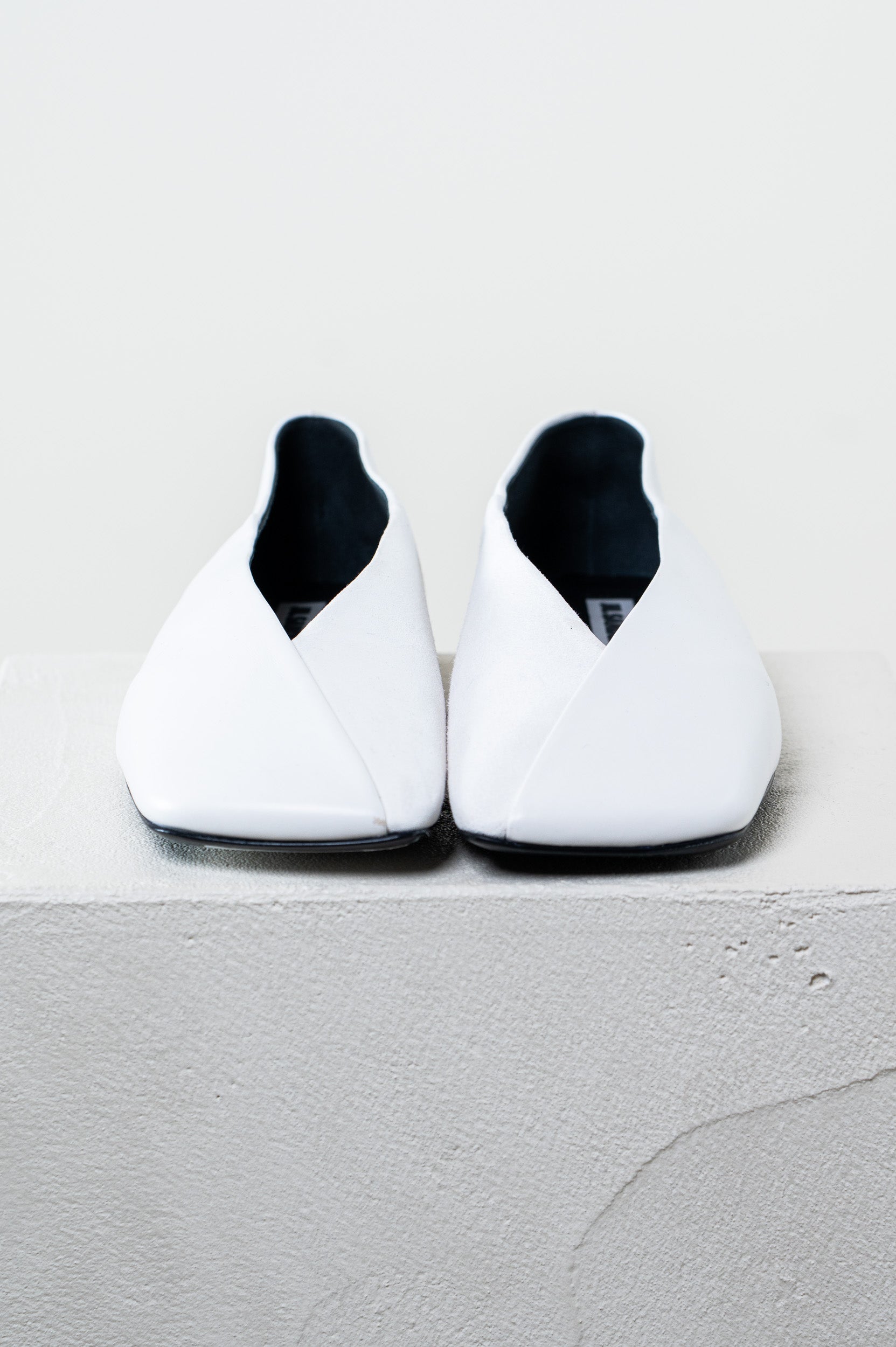 Asymmetric leather ballet flats