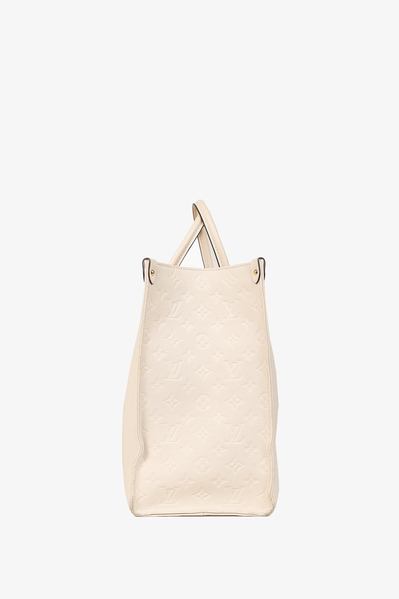 OnTheGo GM Creme Empreinte Monogram Leather Tote Bag
