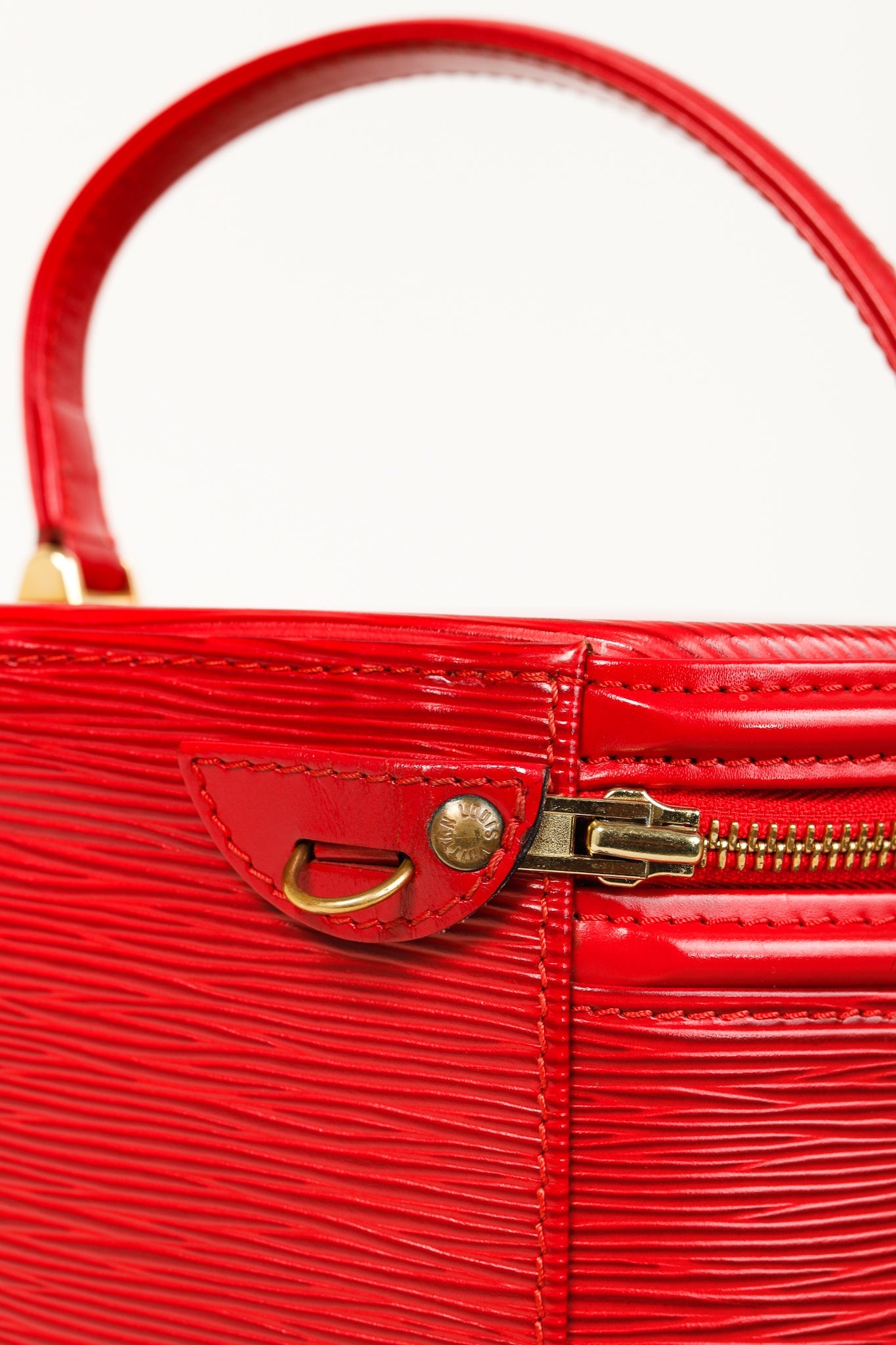 Epi Cannes Castilian Red Leather Round Handbag