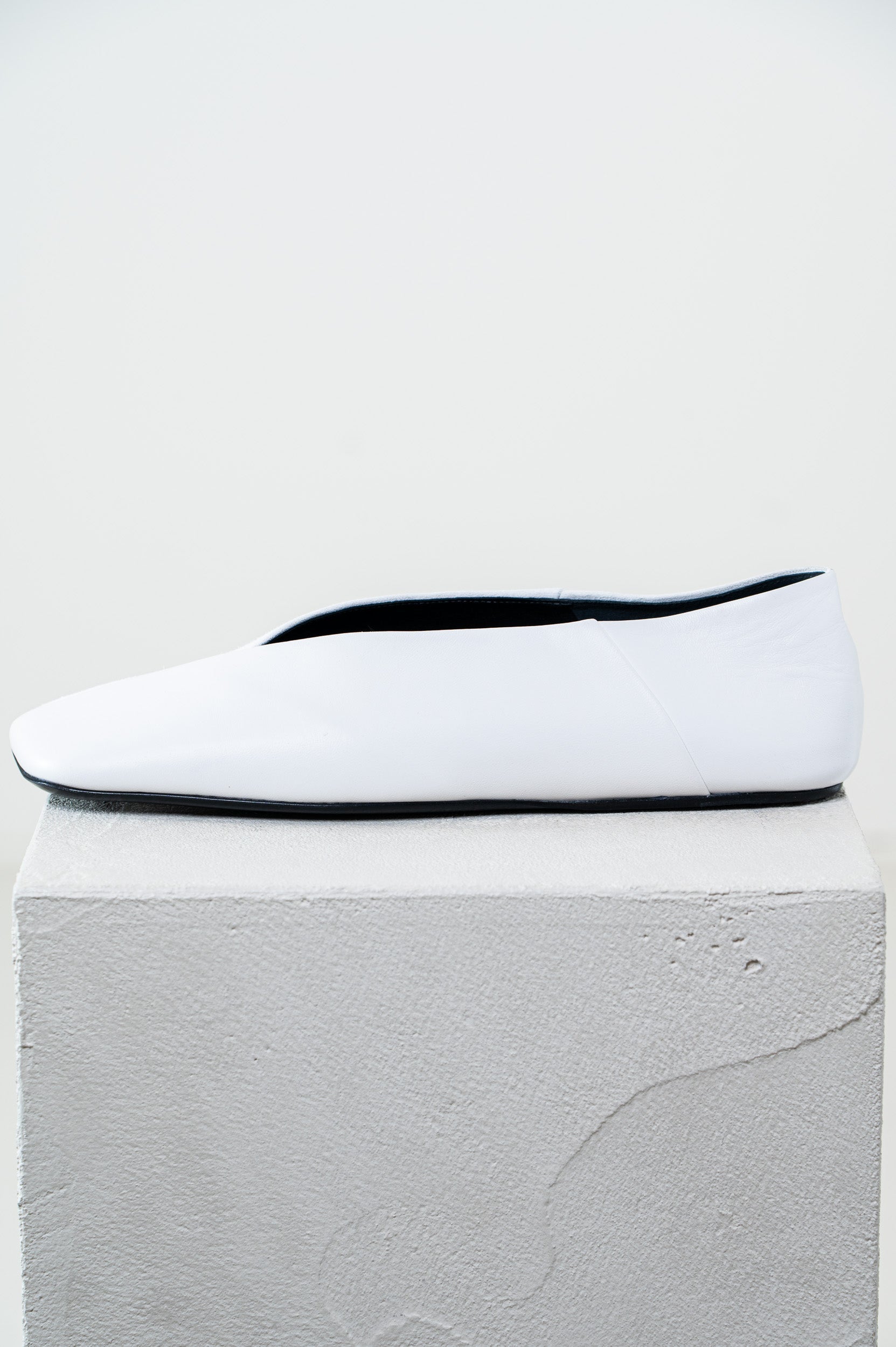 Asymmetric leather ballet flats