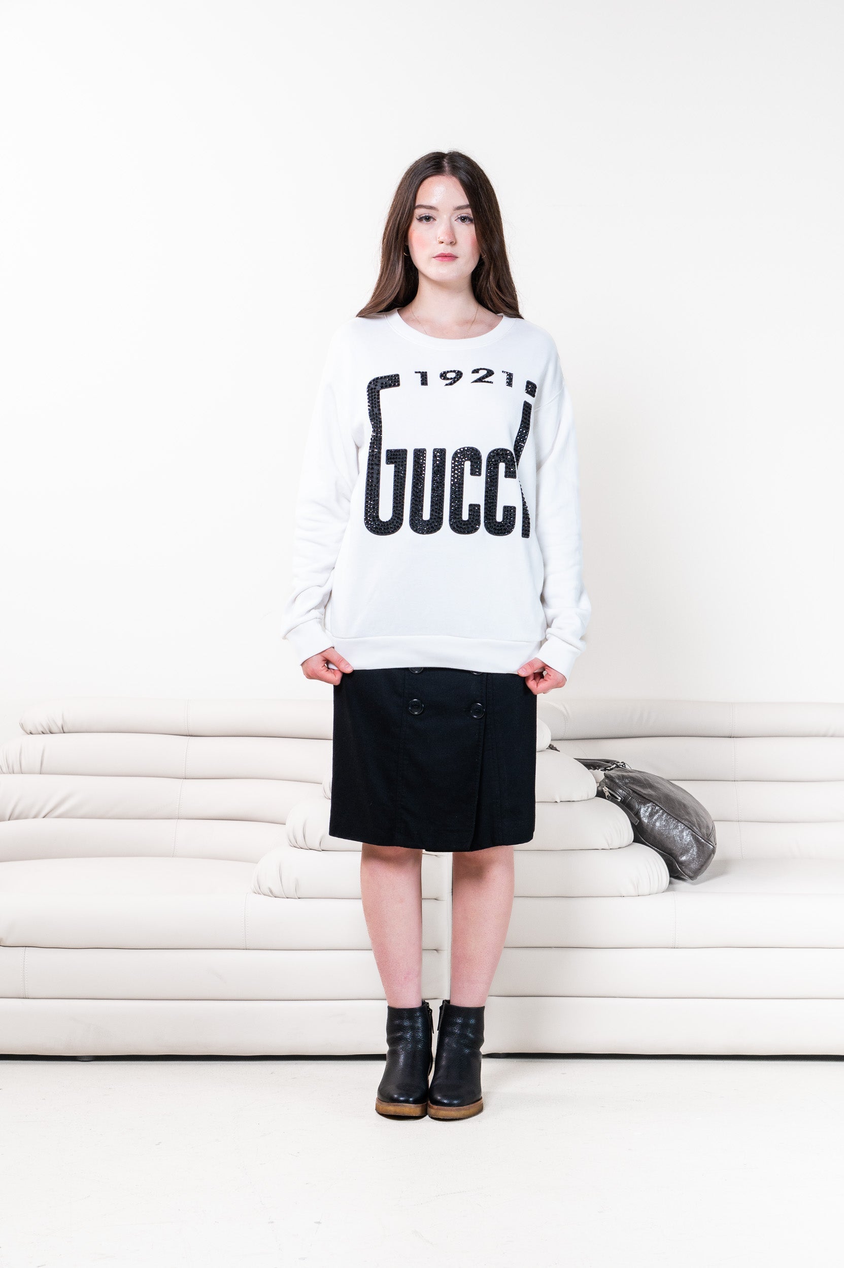 white logo black rhinestone sweater