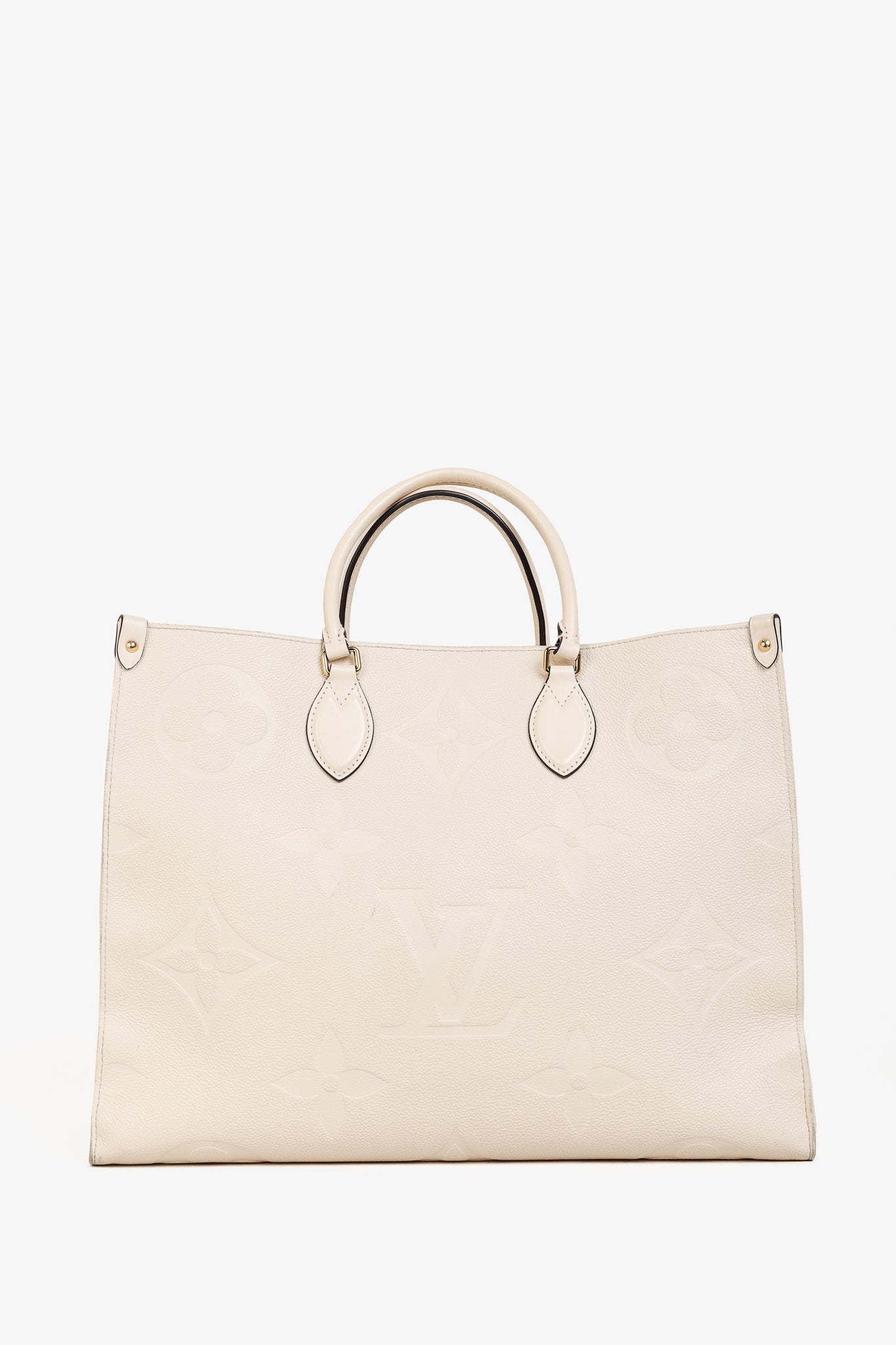 OnTheGo GM Creme Empreinte Monogram Leather Tote Bag
