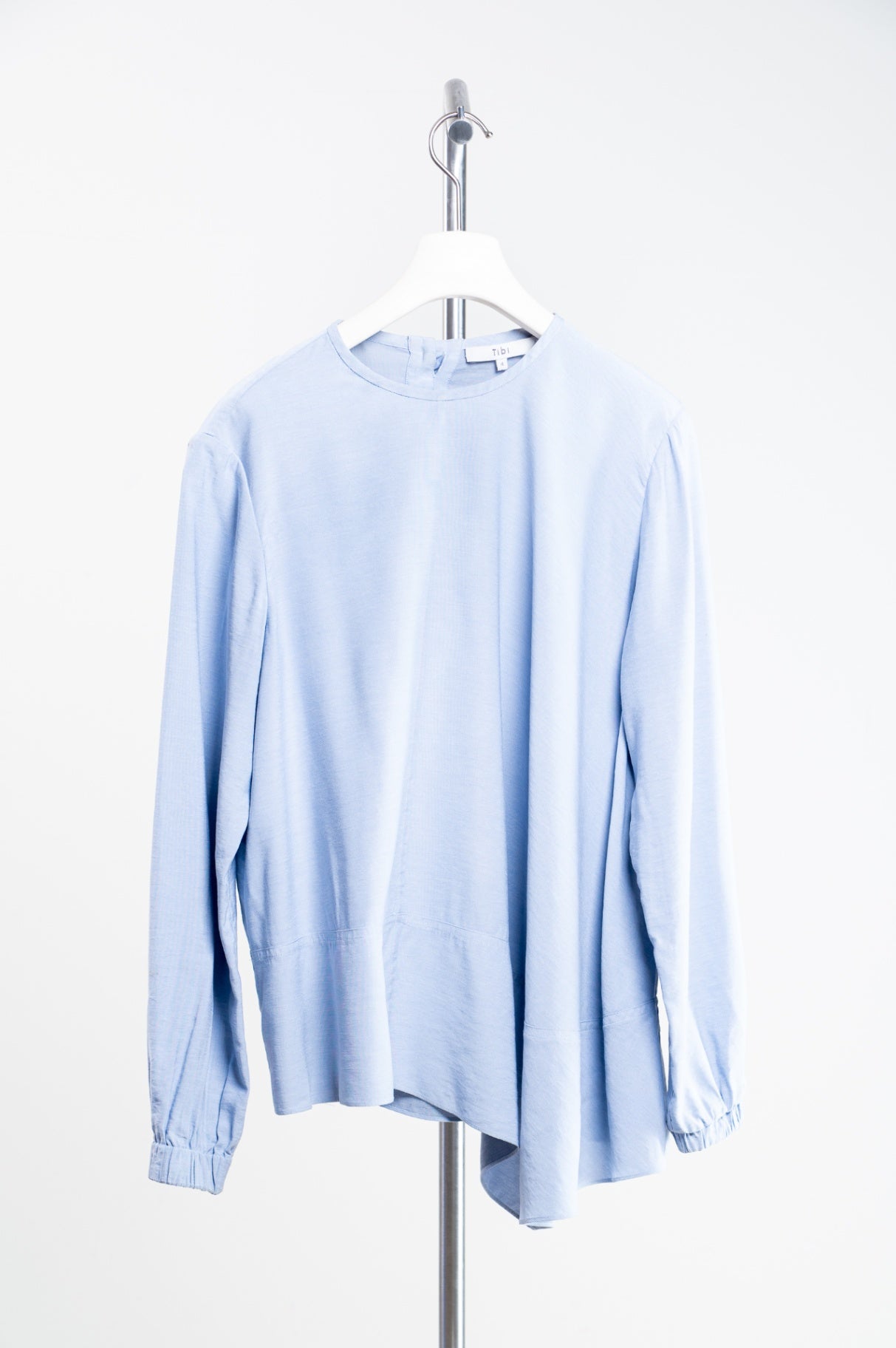 Pale Blue Long Sleeve Asymmetrical Top w/ Button Detail in Back