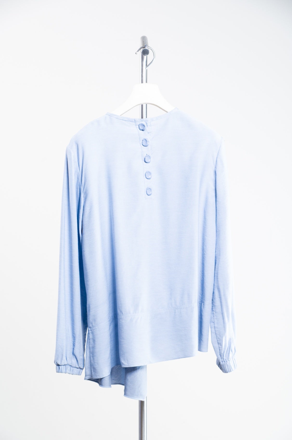 Pale Blue Long Sleeve Asymmetrical Top w/ Button Detail in Back