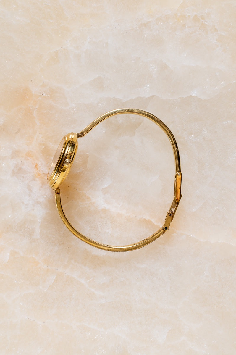Vintage 1100 Series Gold Bezel Watch