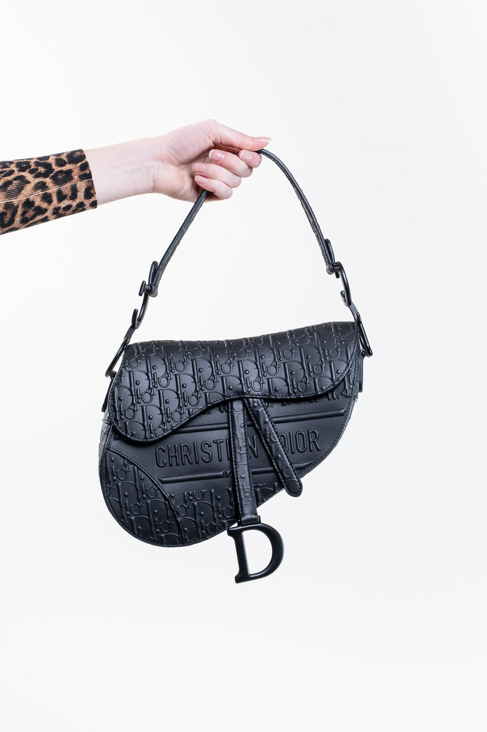Black Oblique Embossed Saddle Bag