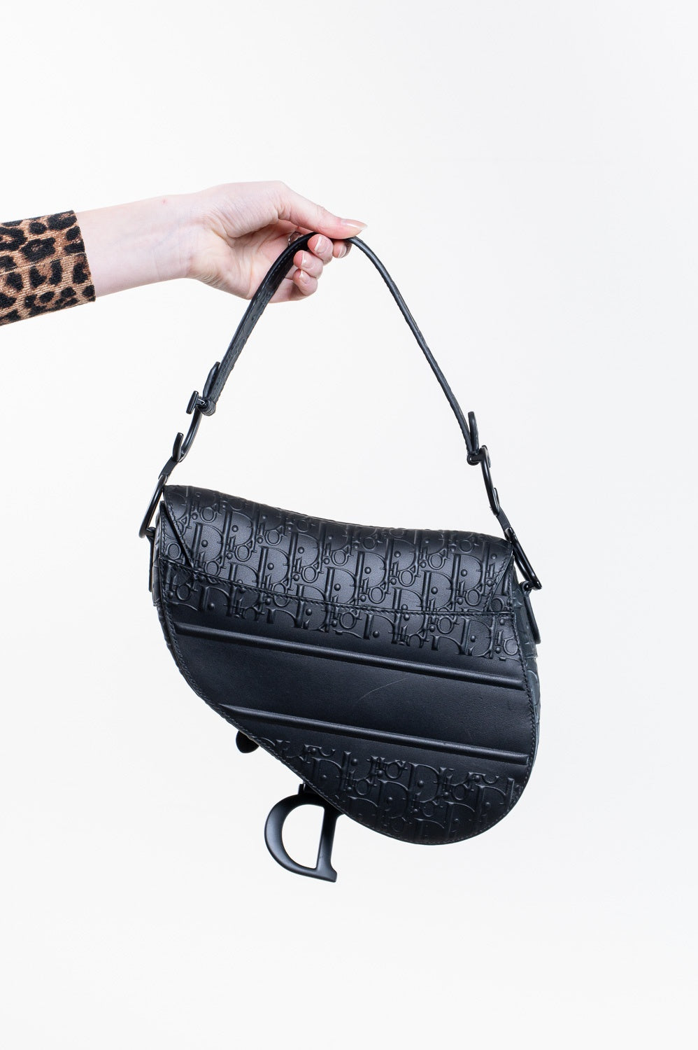 Black Oblique Embossed Saddle Bag