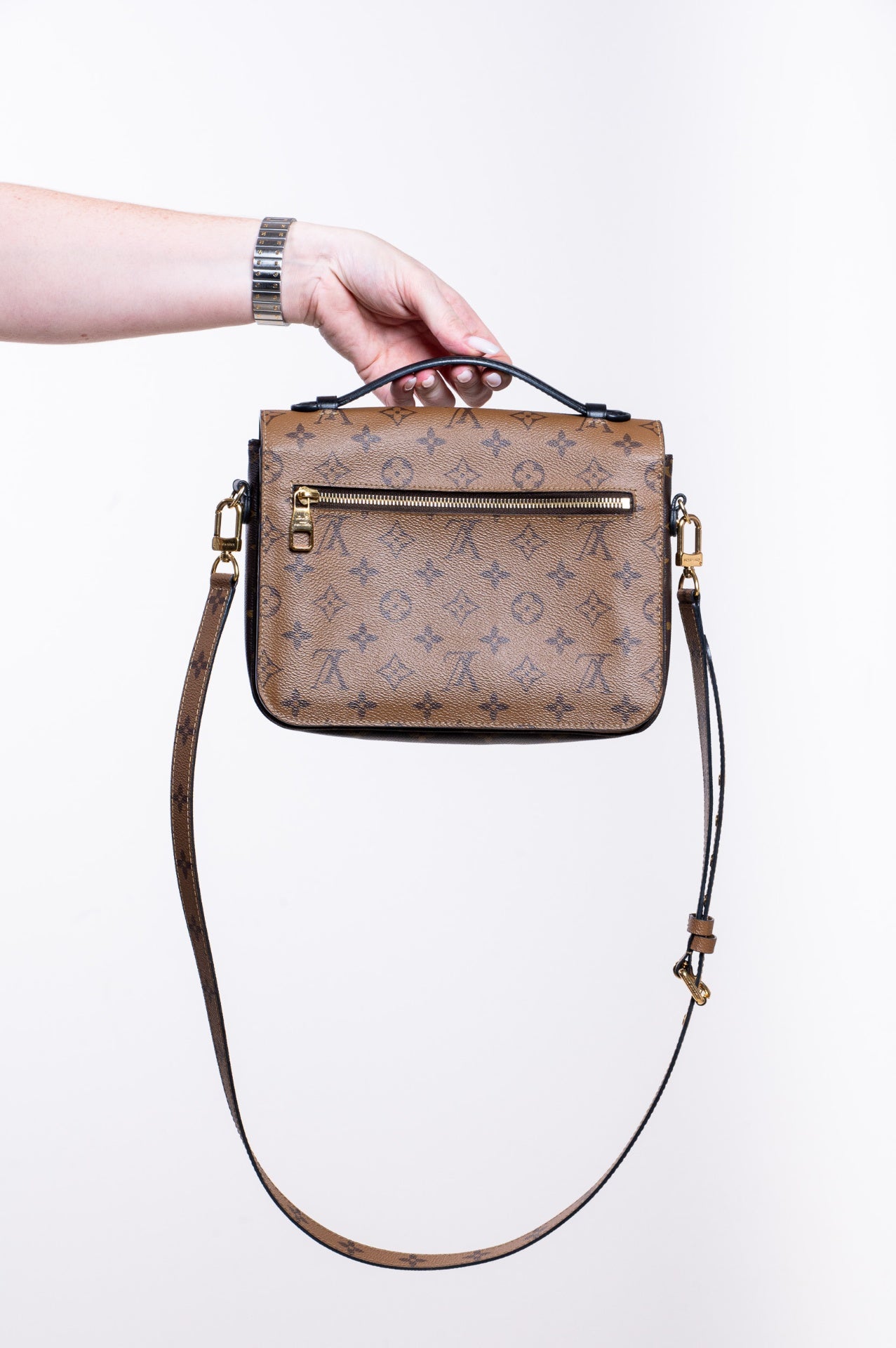 Brown Pochette Metis Reverse Monogram Bag