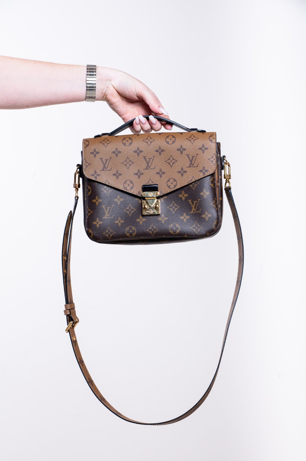 Brown Pochette Metis Reverse Monogram Bag