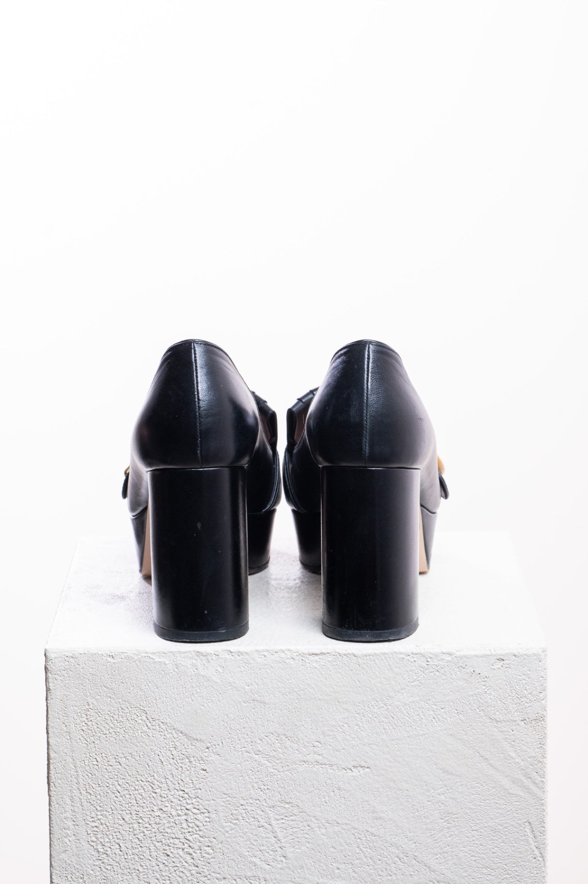 Black Marmont Leather Fringe Platform Pumps