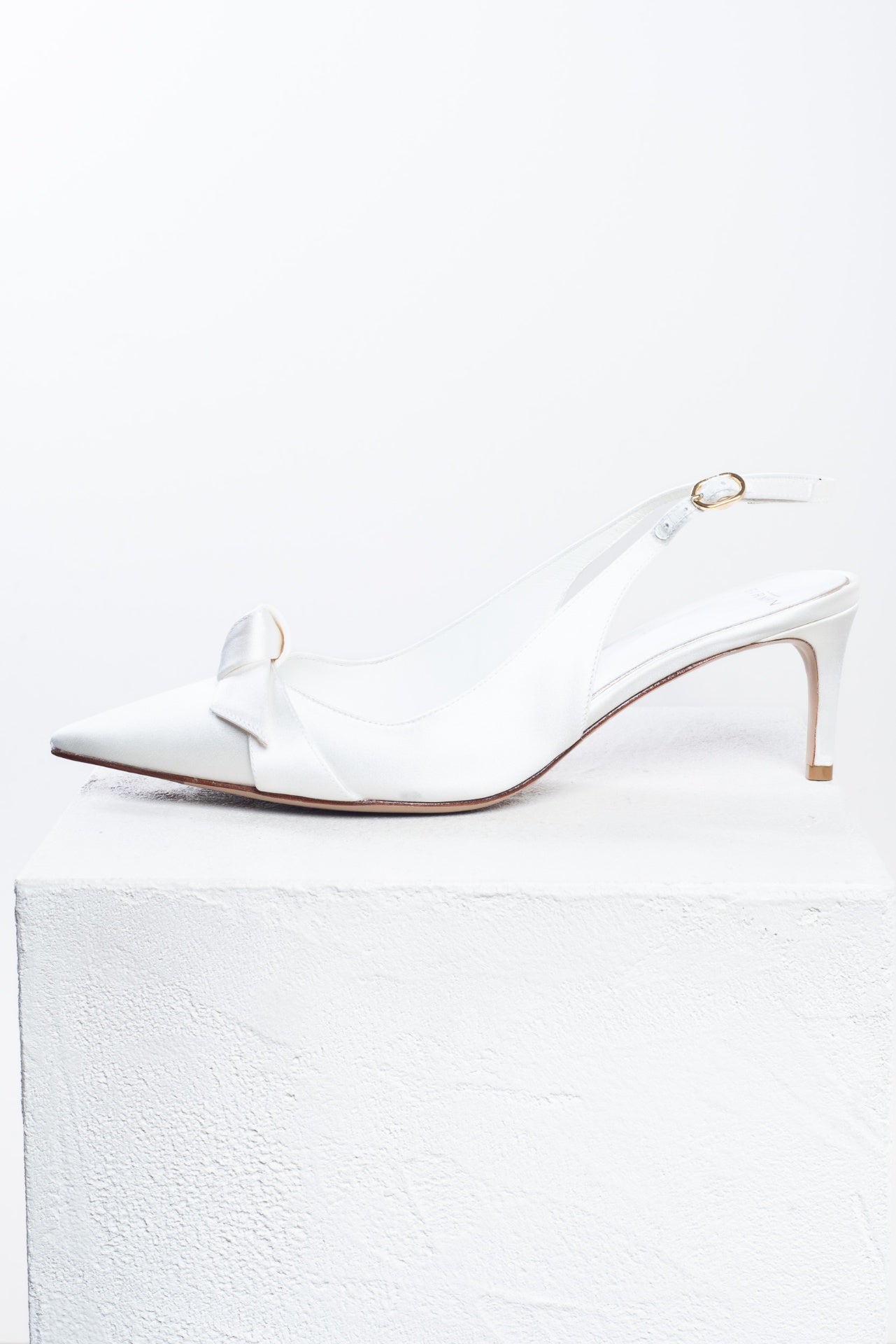Ivory Clarita Slingback Pumps