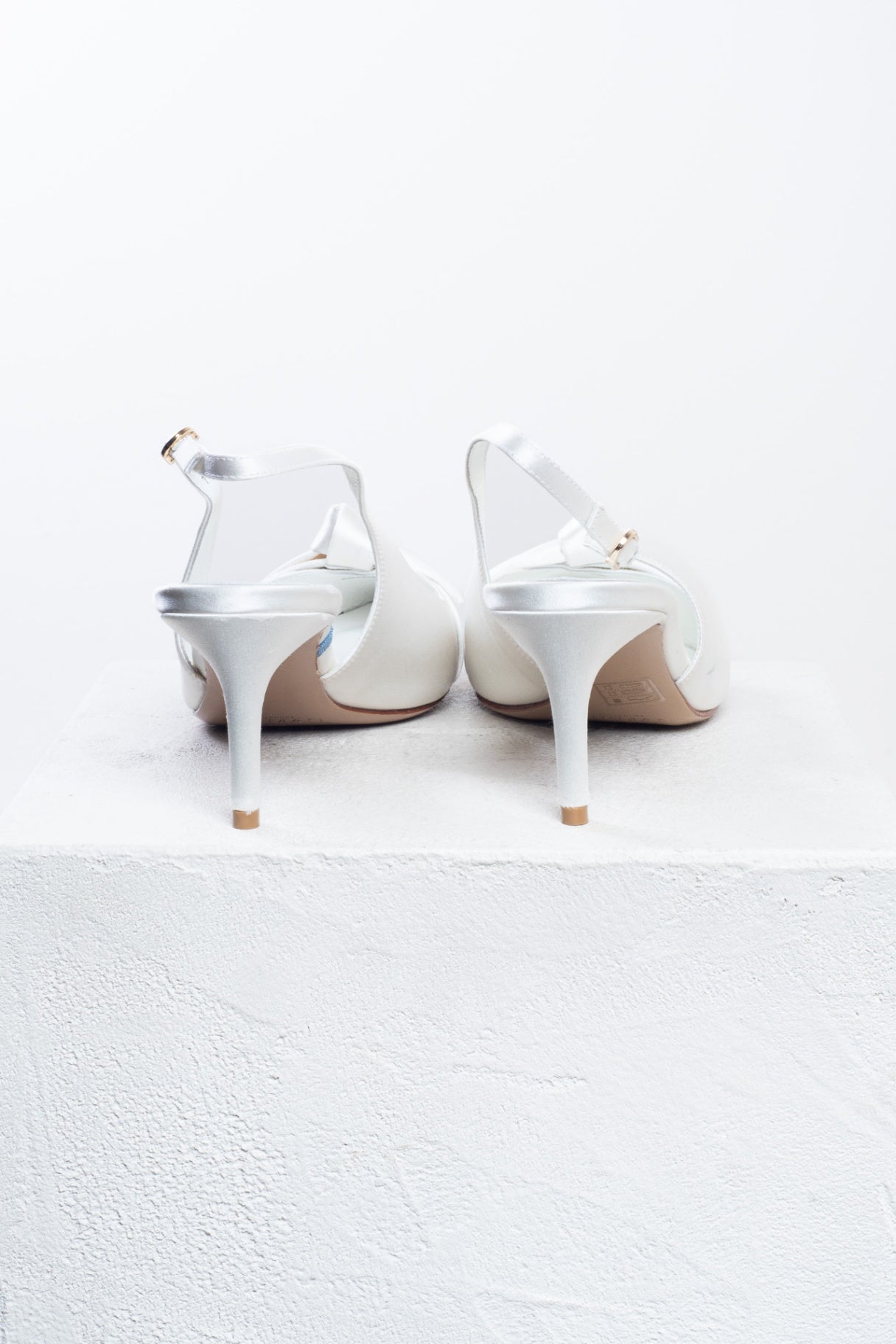 Ivory Clarita Slingback Pumps