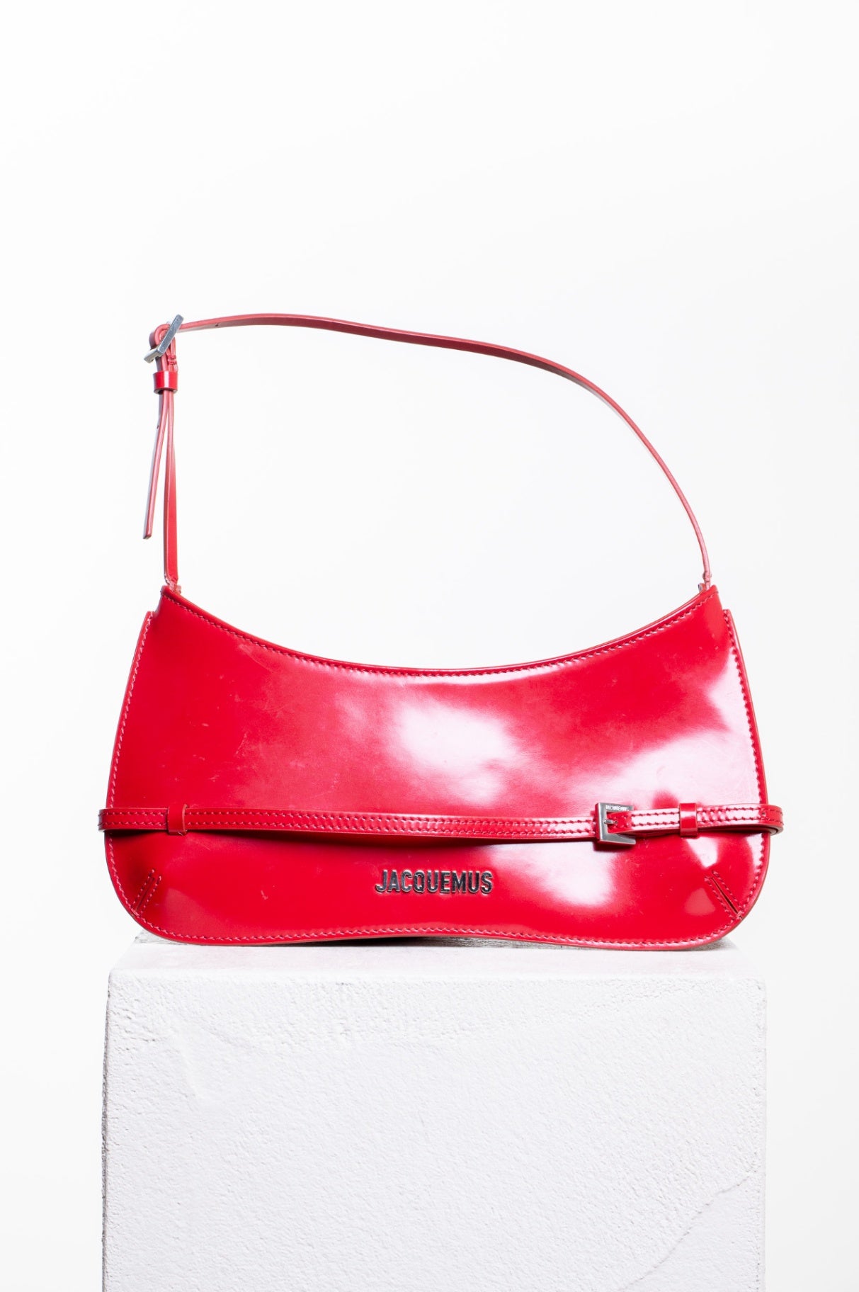 Red Le Bisou Ceinture Shoulder Bag with buckle strap