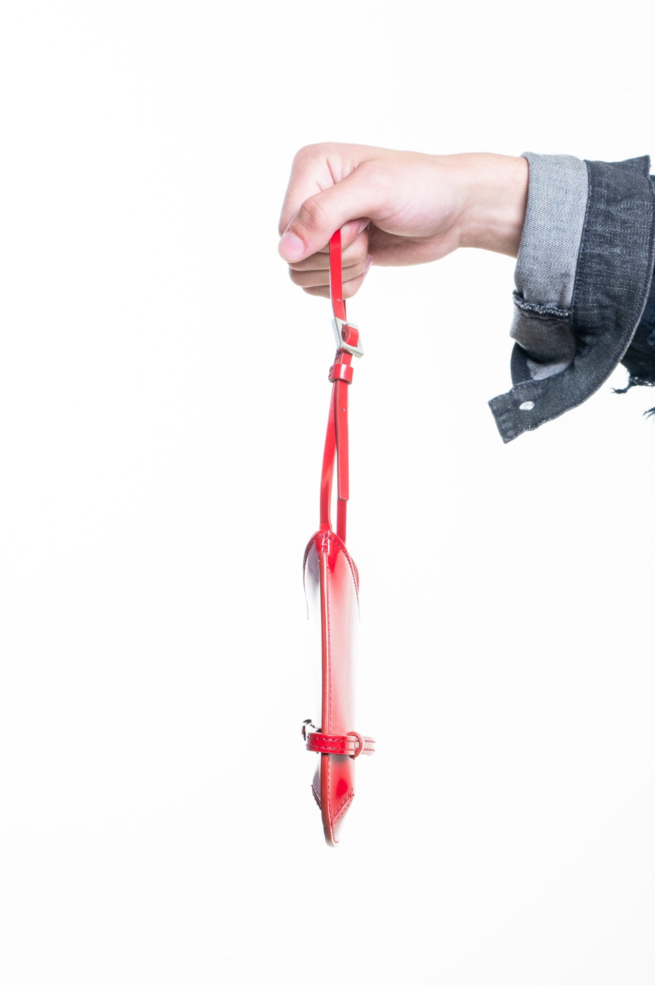 Red Le Bisou Ceinture Shoulder Bag with buckle strap