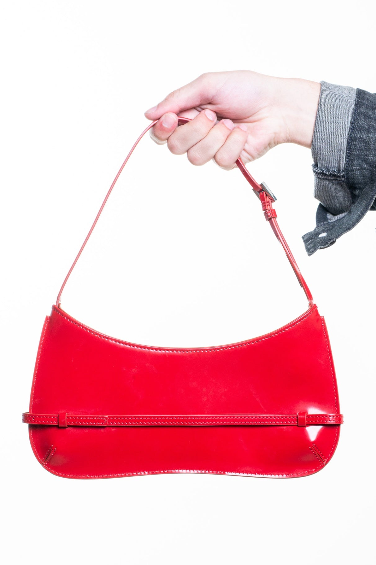 Red Le Bisou Ceinture Shoulder Bag with buckle strap
