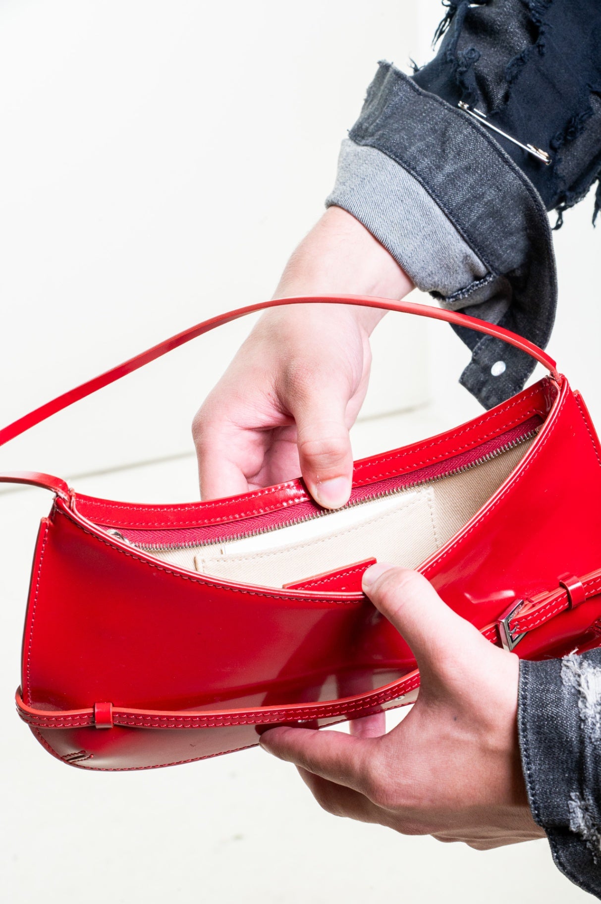 Red Le Bisou Ceinture Shoulder Bag with buckle strap