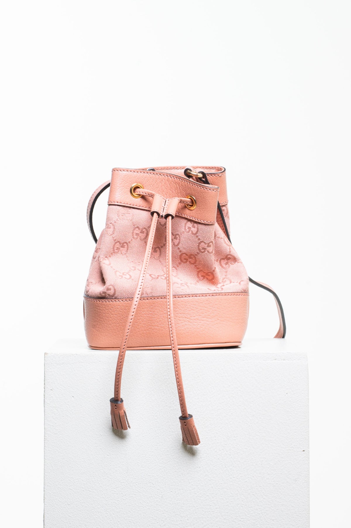 Pink Ophidia Mini Bucket Crossbody Bag