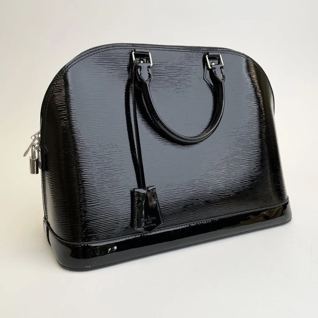 Louis Vuitton Brown Coated Canvas Monogram Top Zip Makeup Bag Bag — Labels  Resale Boutique