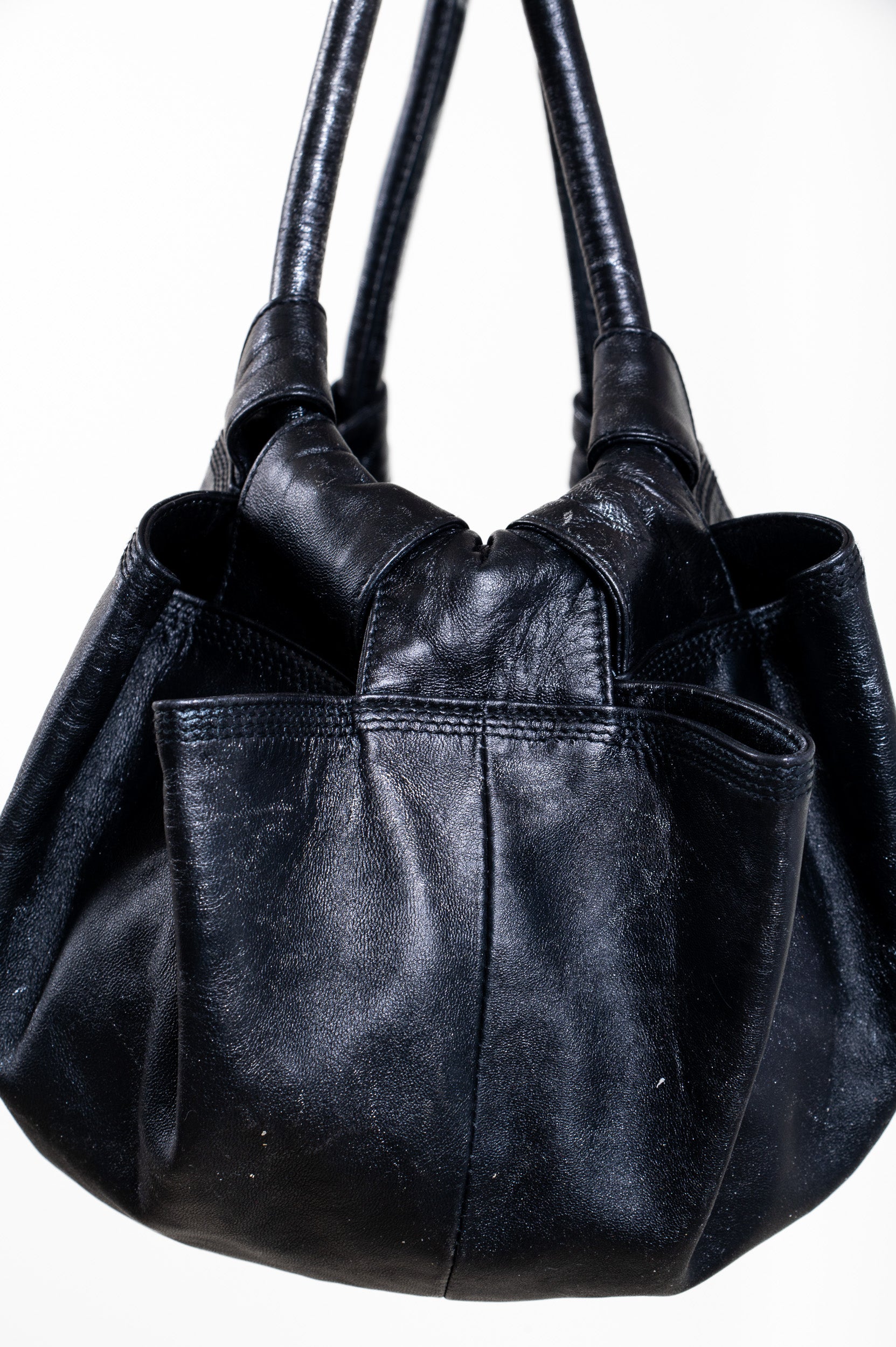 Black Leather Metallic Napa Aire Bag