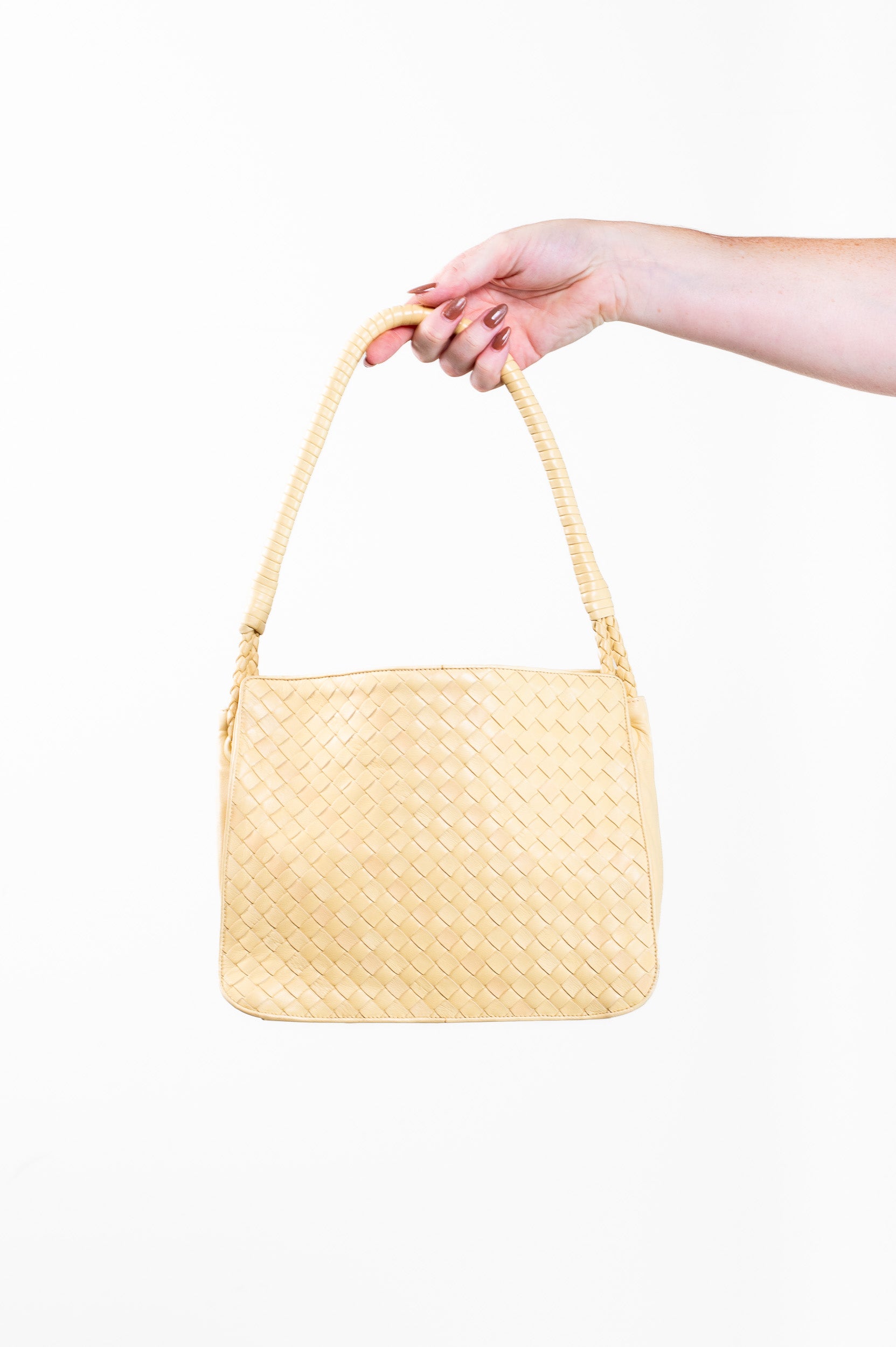 Front view of Bottega Veneta Vintage Intrecciato Butter Yellow Shoulder Bag