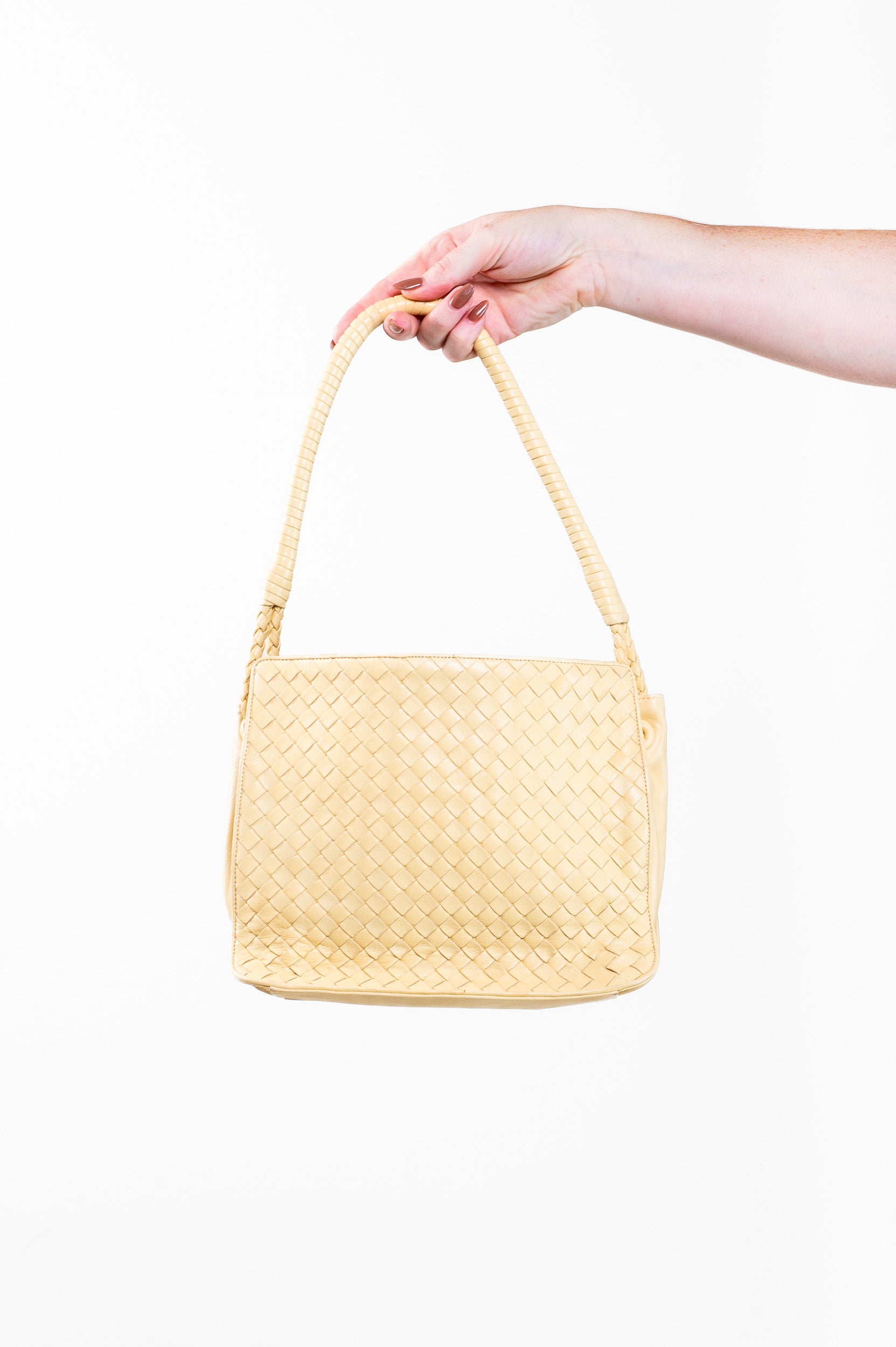 Back view of Bottega Veneta Vintage Intrecciato Butter Yellow Shoulder Bag