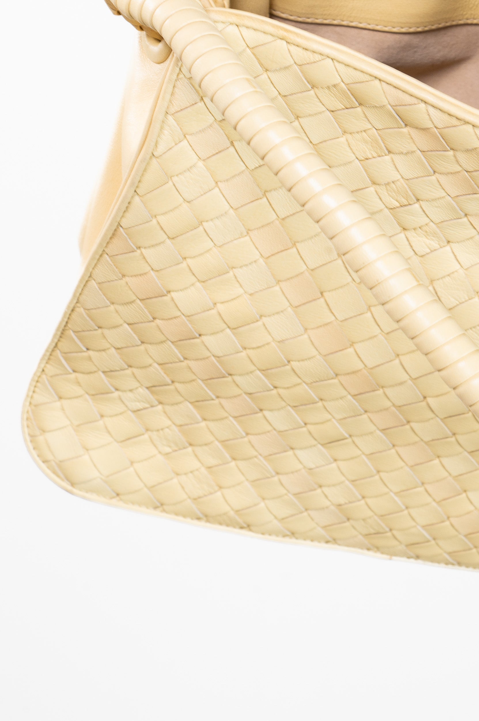 Close-up view of Bottega Veneta Vintage Intrecciato Butter Yellow Shoulder Bag