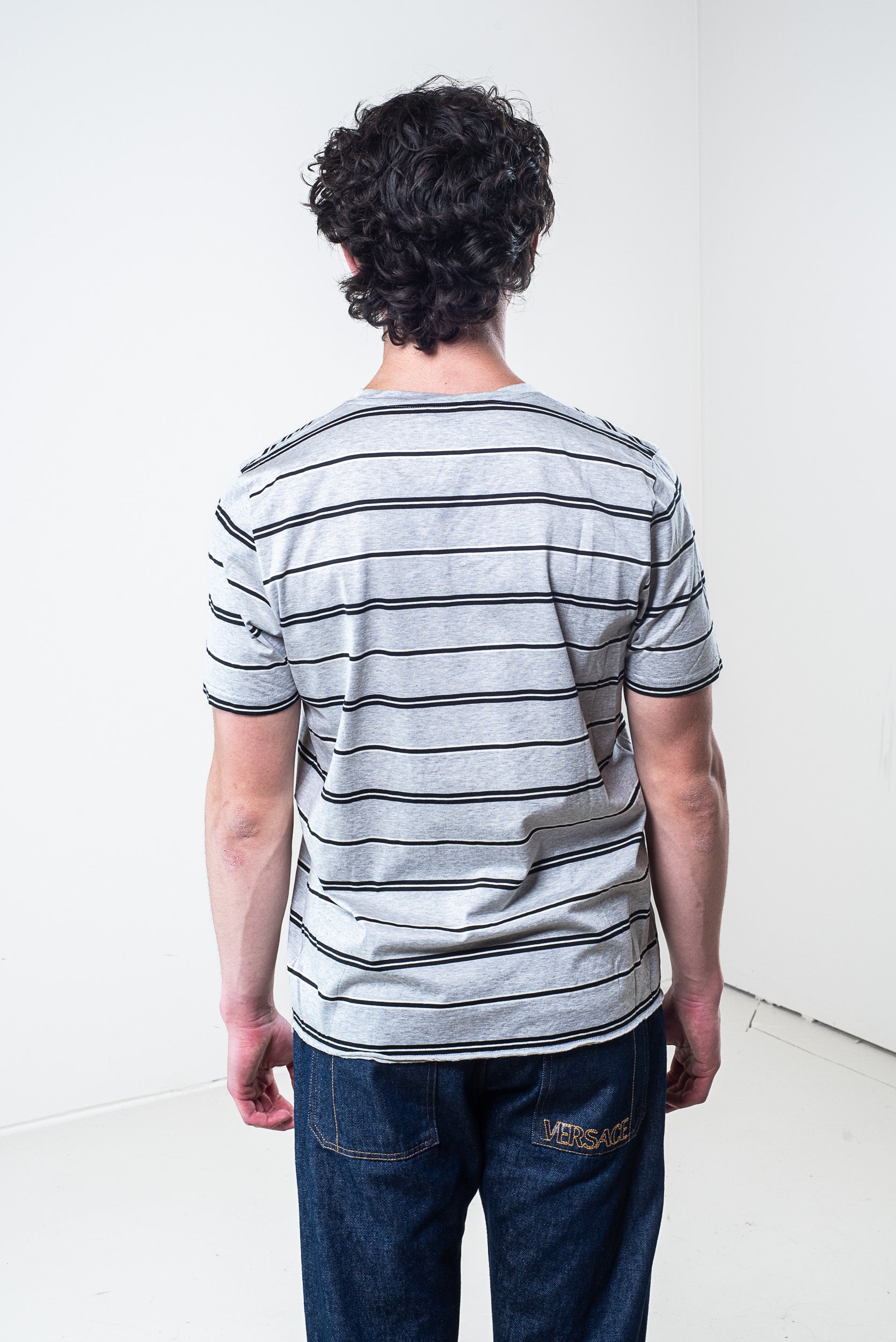 Rear view of Saint Laurent Grey and Black Striped Cotton T-Shirt