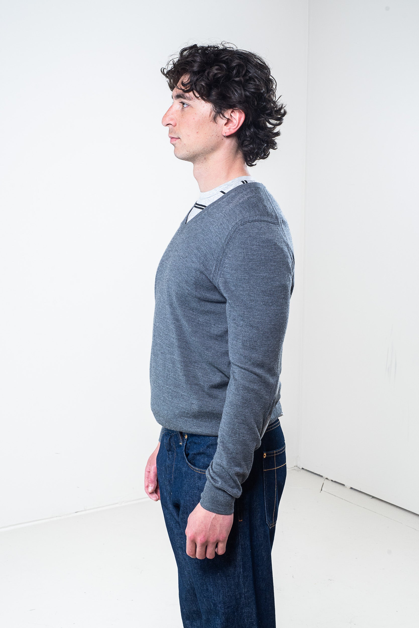 Side view of Burberry Brit grey V-neck wool sweater
