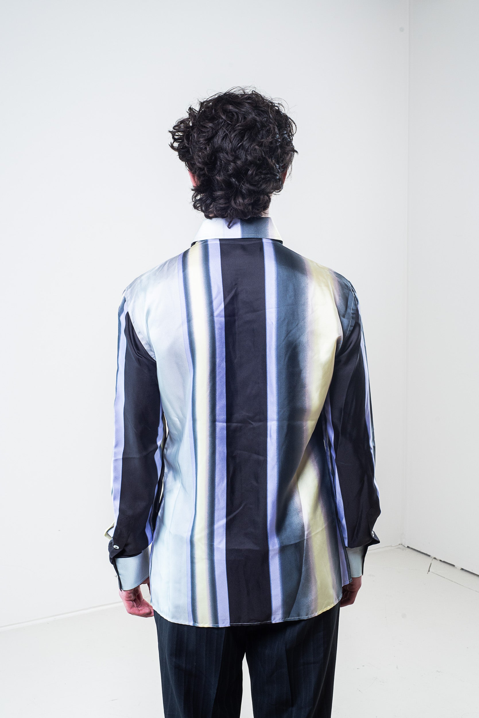 Back view of Versace Men’s Silk Button-Down Shirt with bold multicolour stripes