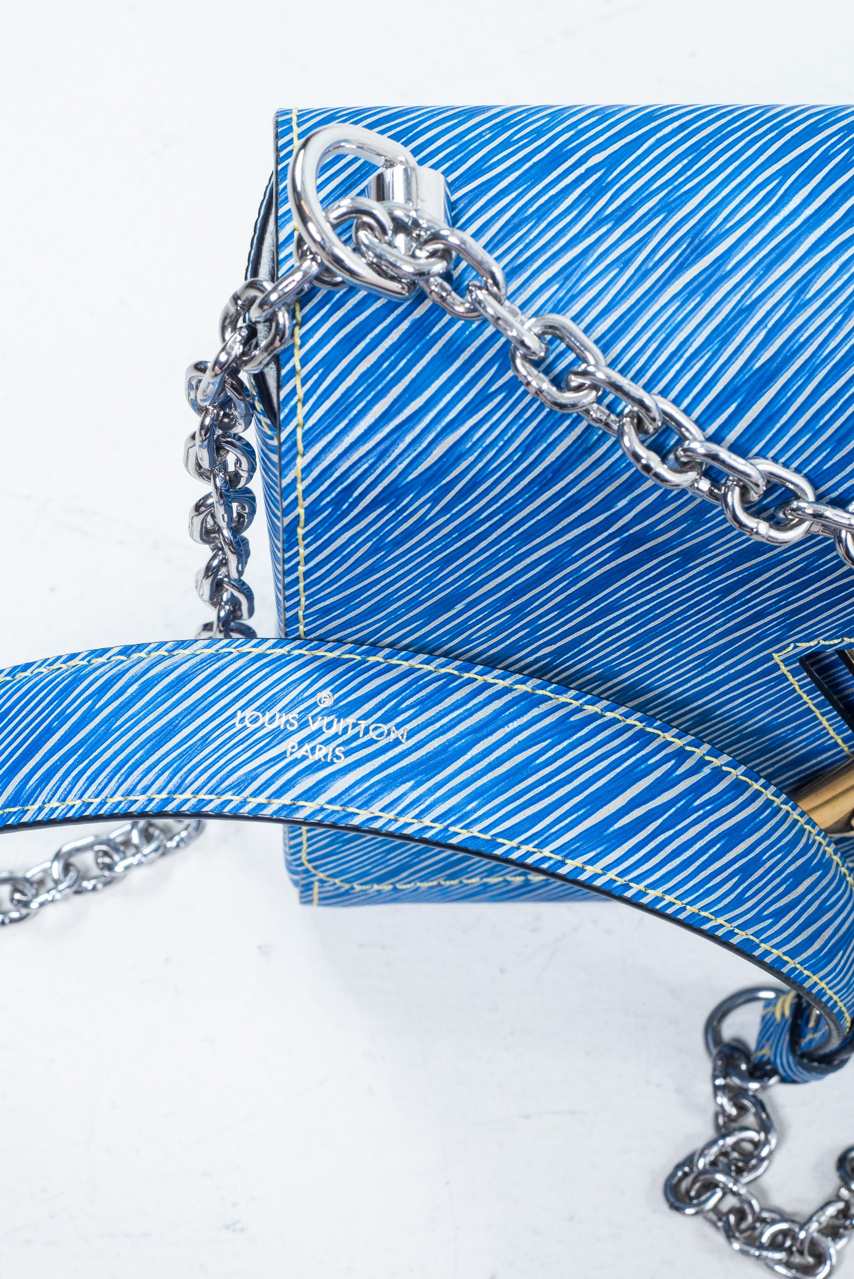 Epi Leather Blue Twist MM Crossbody Bag
