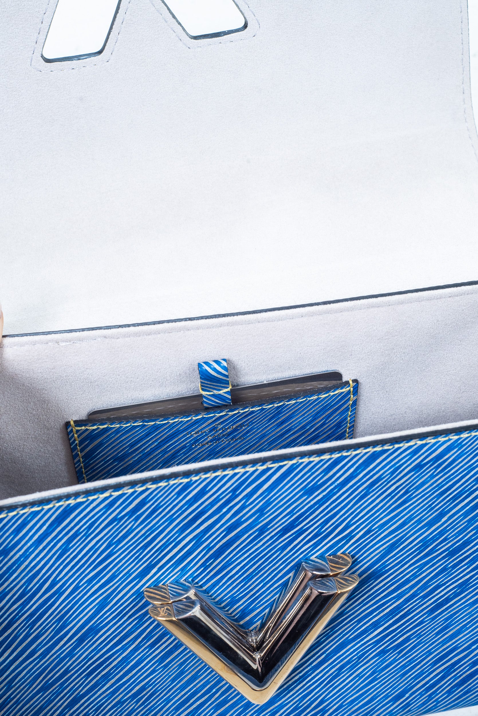 Epi Leather Blue Twist MM Crossbody Bag