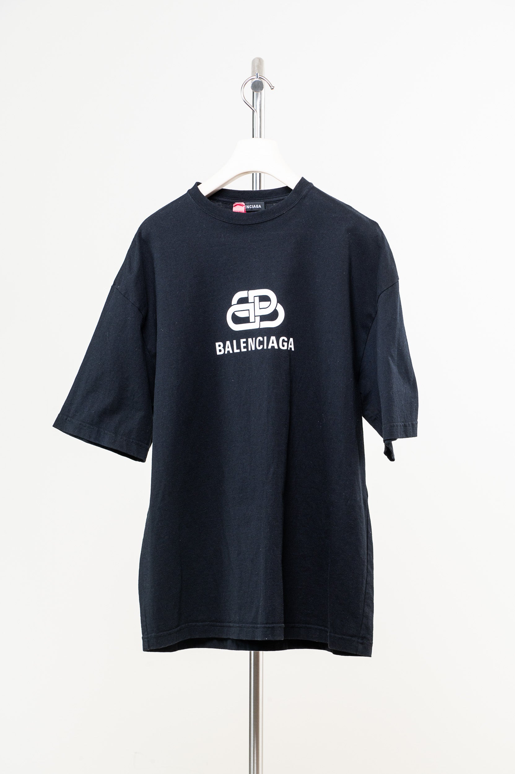 Front view of Balenciaga black and white logo tee
