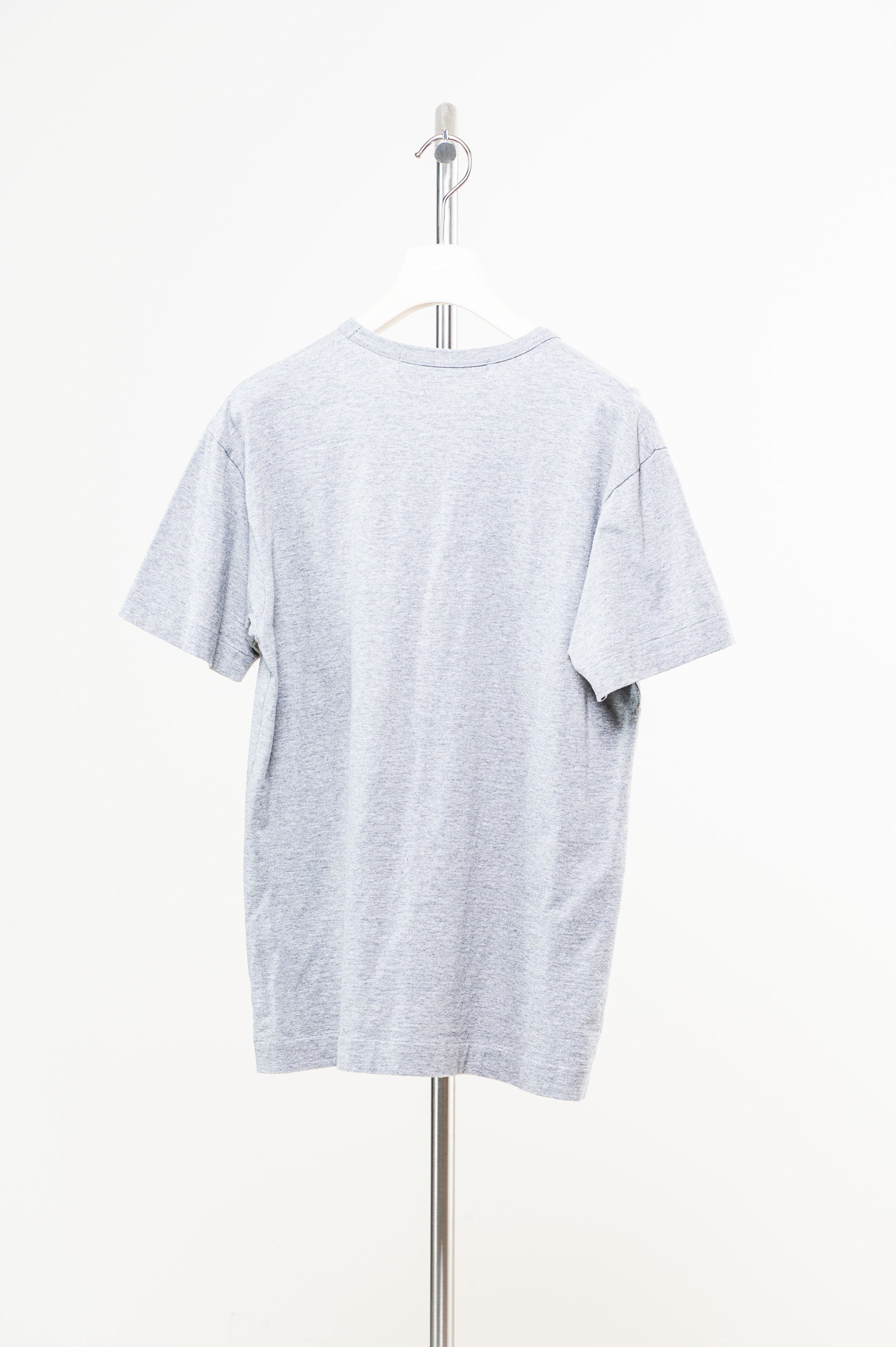 Back view of Comme Des Garçons grey logo tee