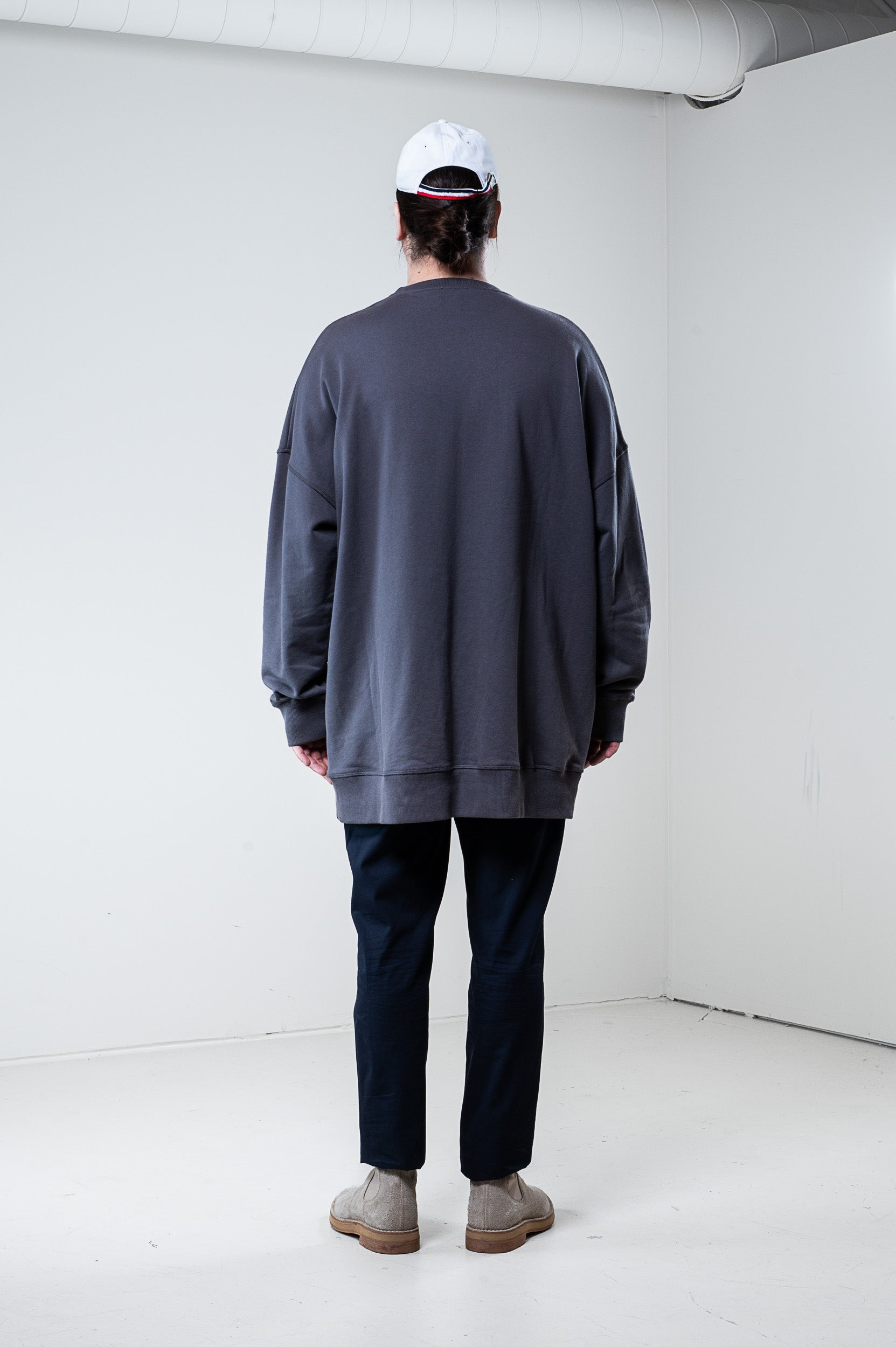 Back view of J.W. Anderson Grey Patch Knit Crew Neck Sweater