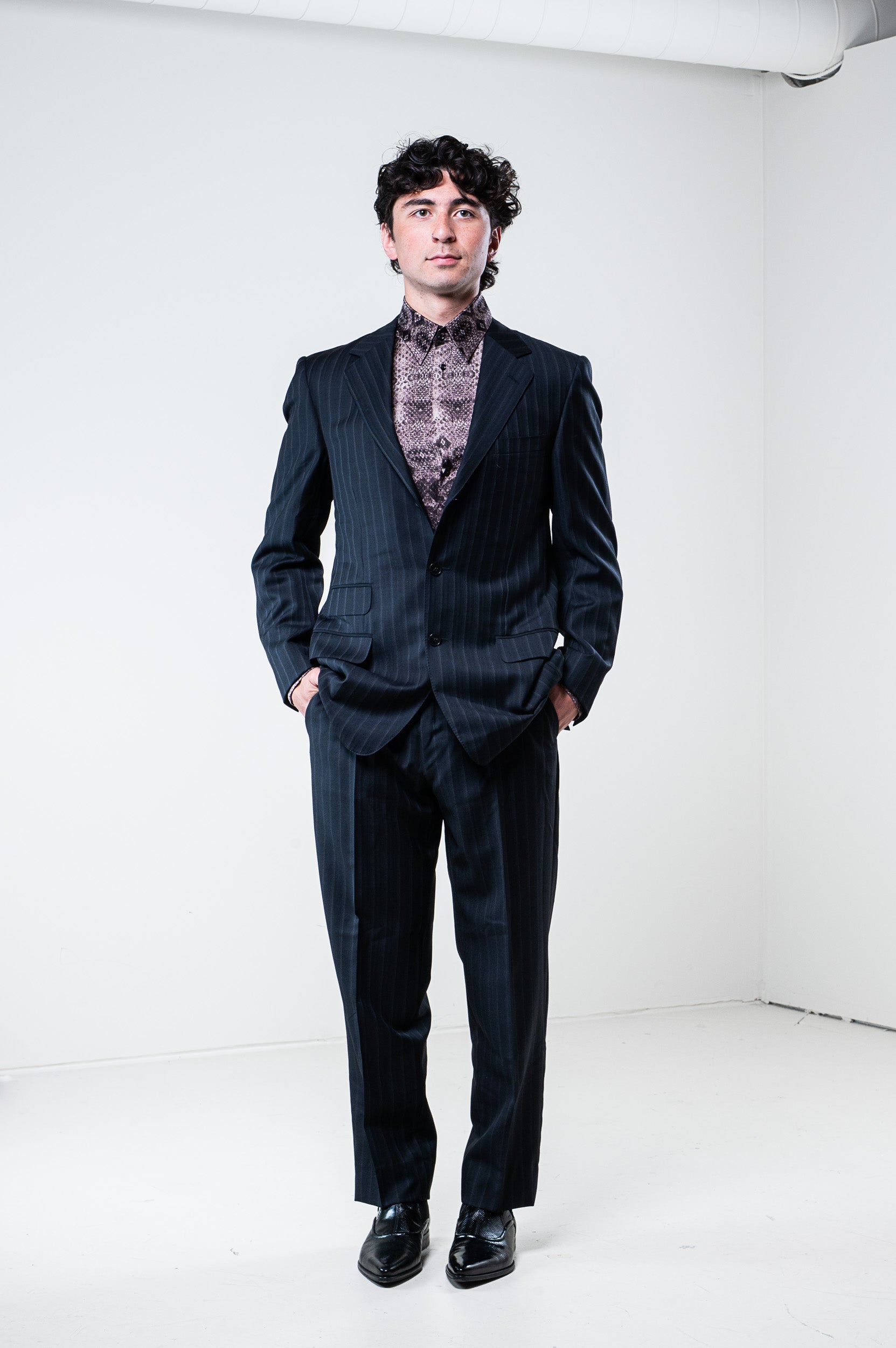 Model wearing Gucci silk butterfly shirt – front view