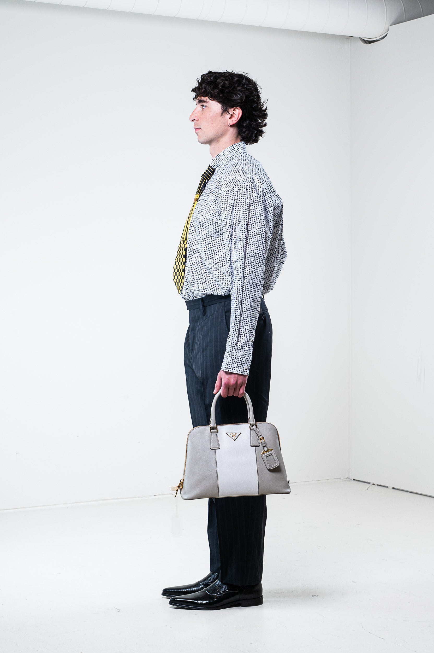 Model wearing Gianni Versace Vintage Yellow Square Tie – side view