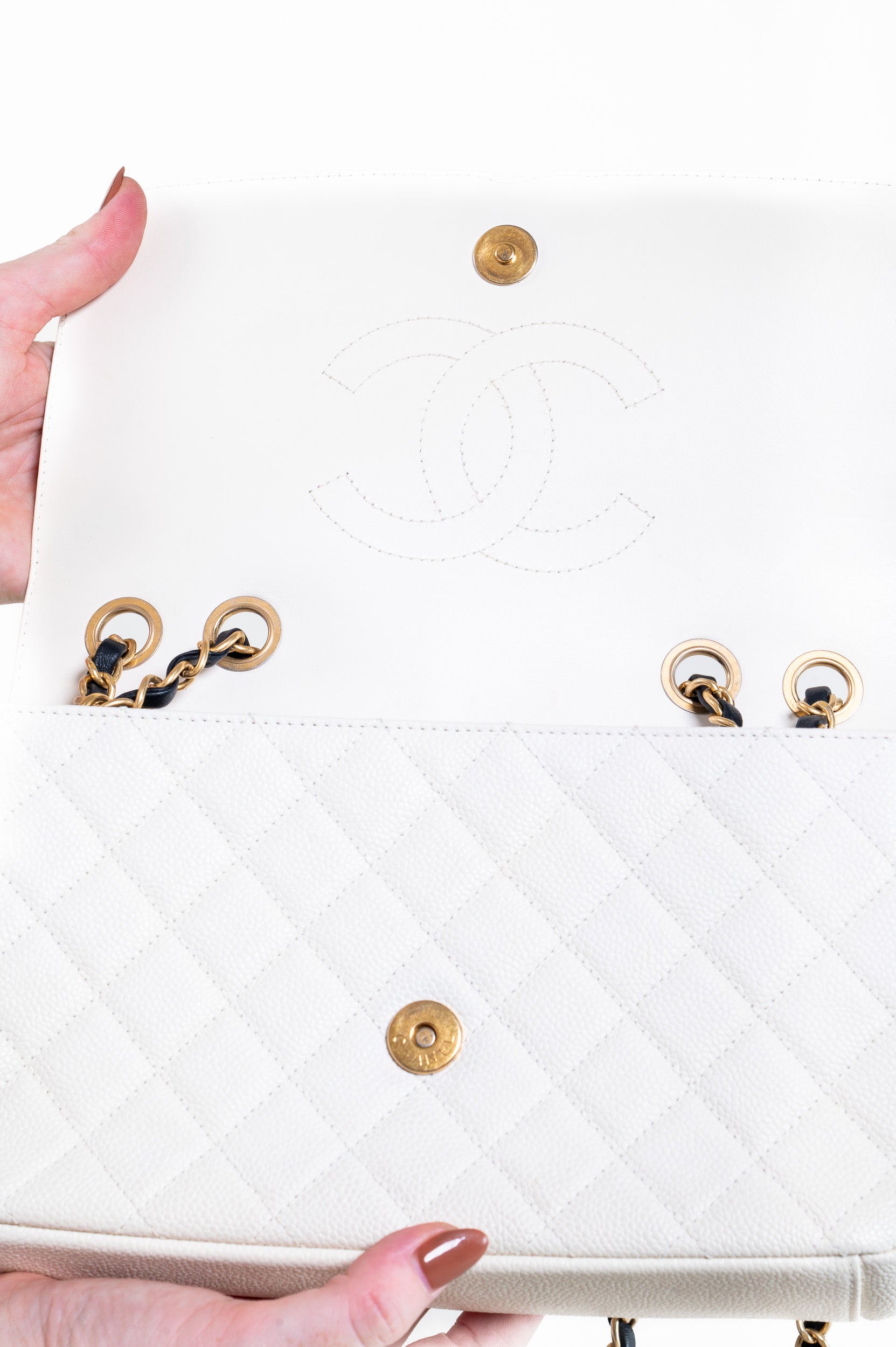 Interior view of Chanel Medium Caviar CC Filigree Flap Bag