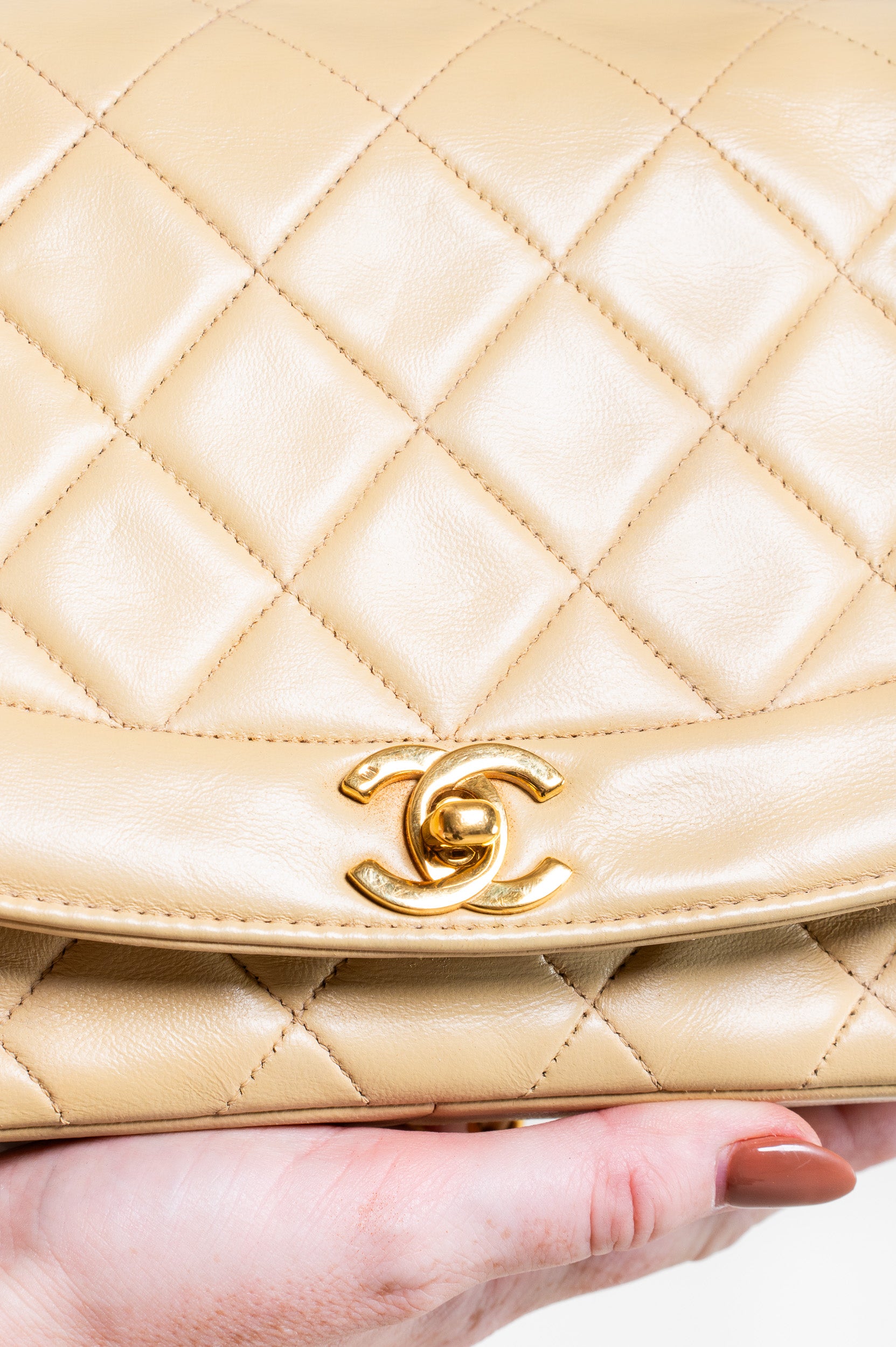 Close-up view of Chanel Vintage Small Beige Lambskin Diana Flap Bag