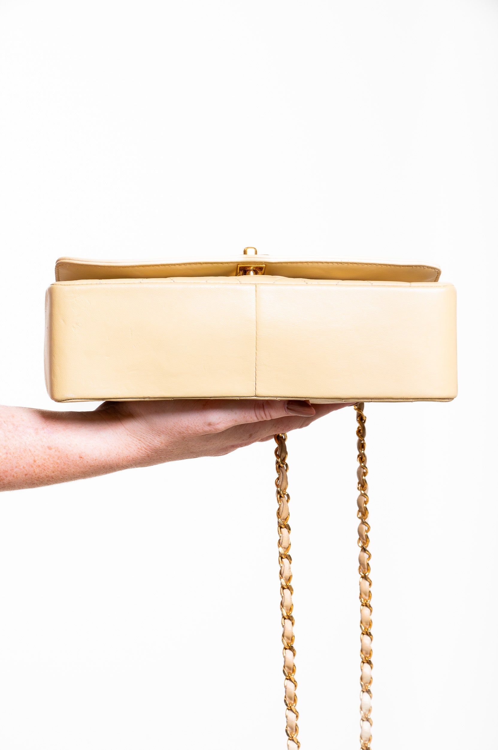 Bottom view of Chanel Vintage Small Beige Lambskin Diana Flap Bag