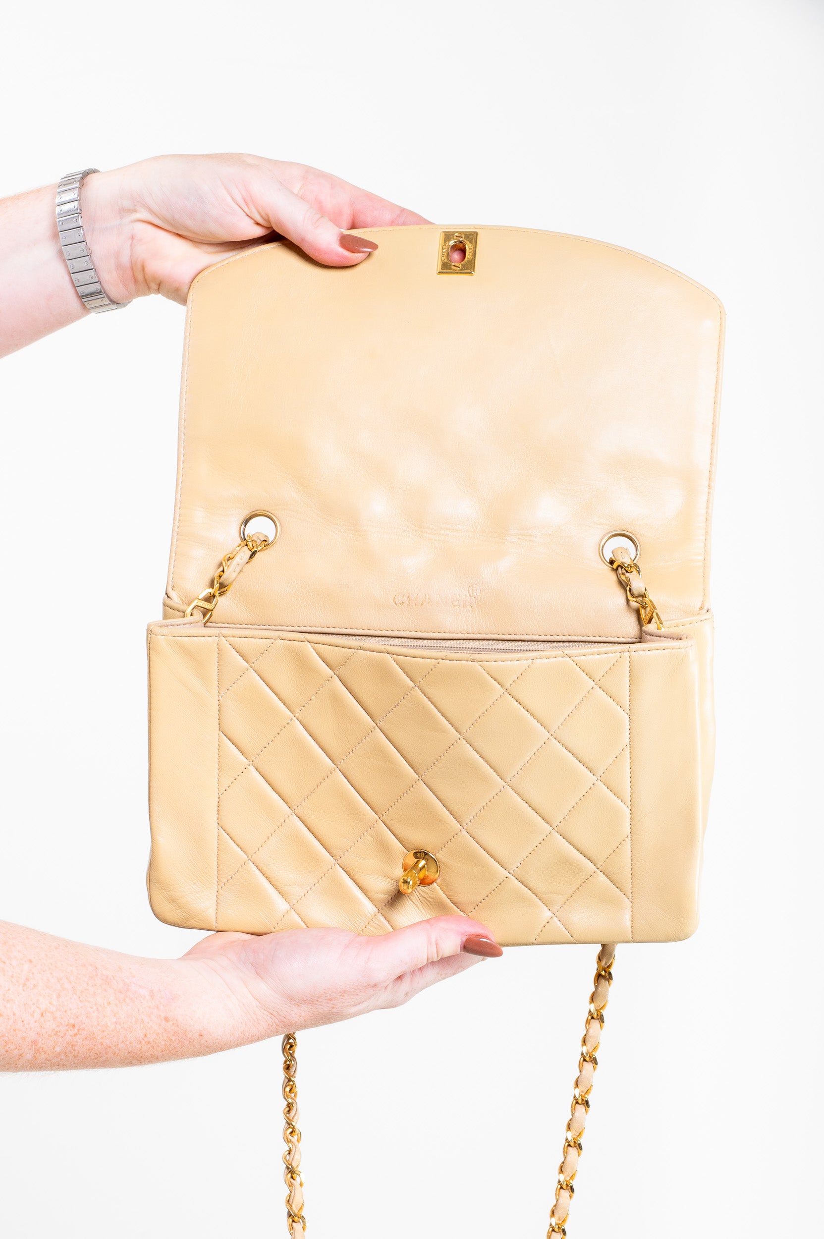 Interior view of Chanel Vintage Small Beige Lambskin Diana Flap Bag