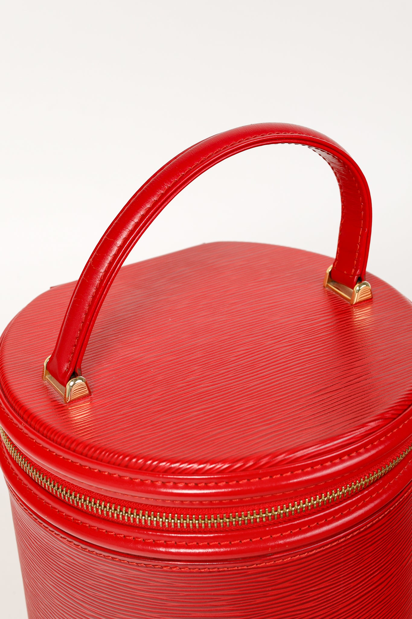 Epi Cannes Castilian Red Leather Round Handbag