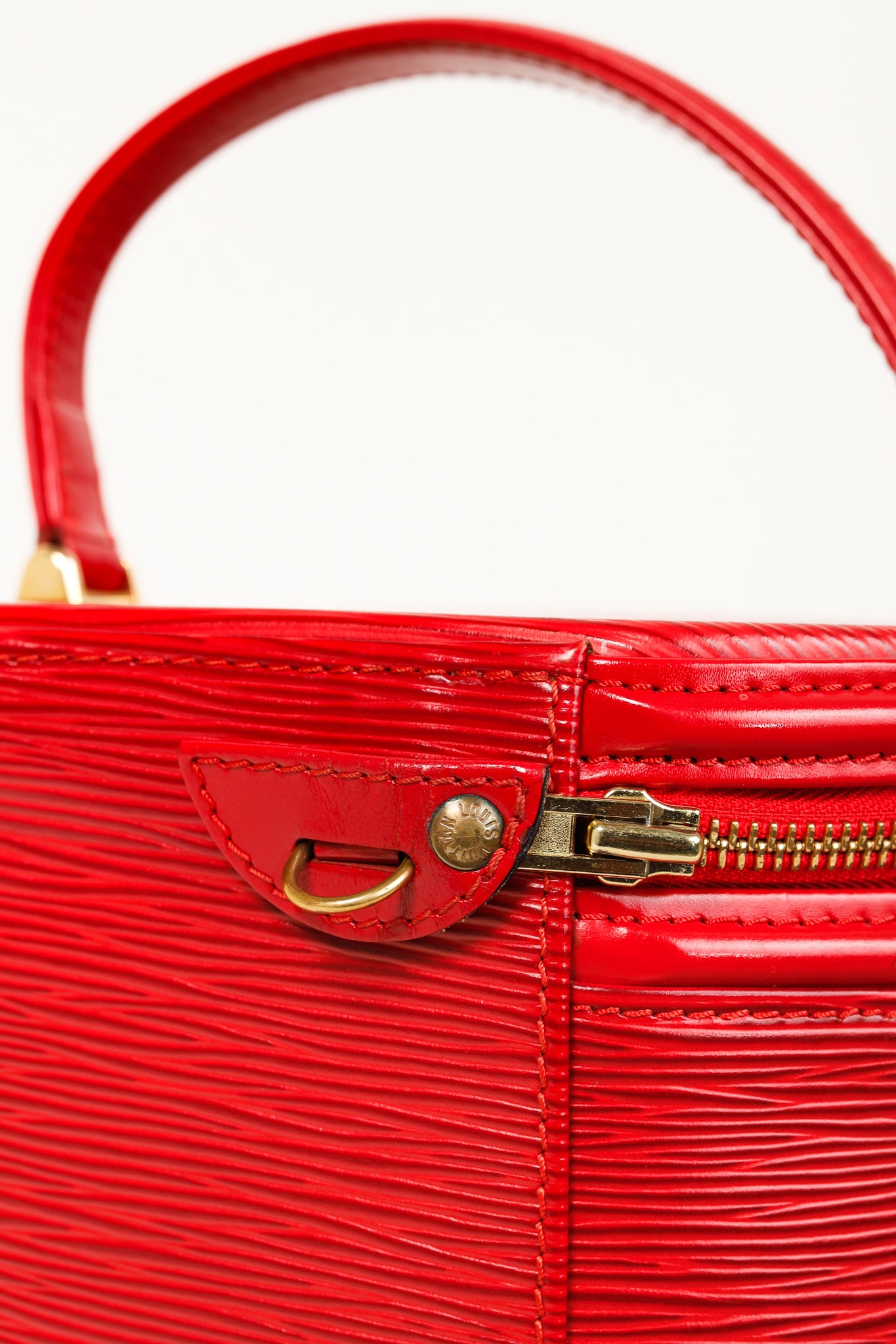 Epi Cannes Castilian Red Leather Round Handbag