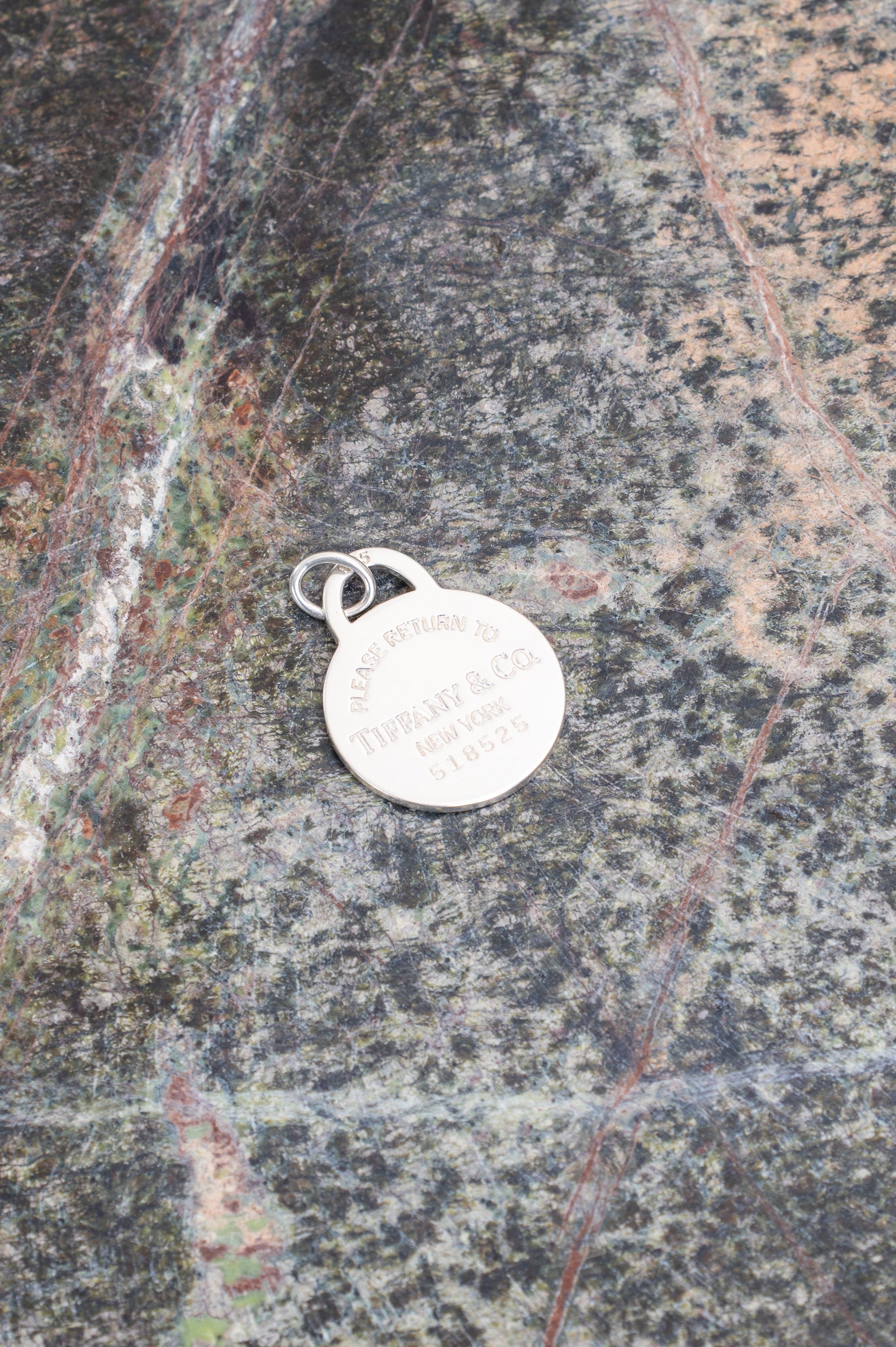 Front view of Tiffany & Co. Return to Tiffany Round Tag Circle Charm