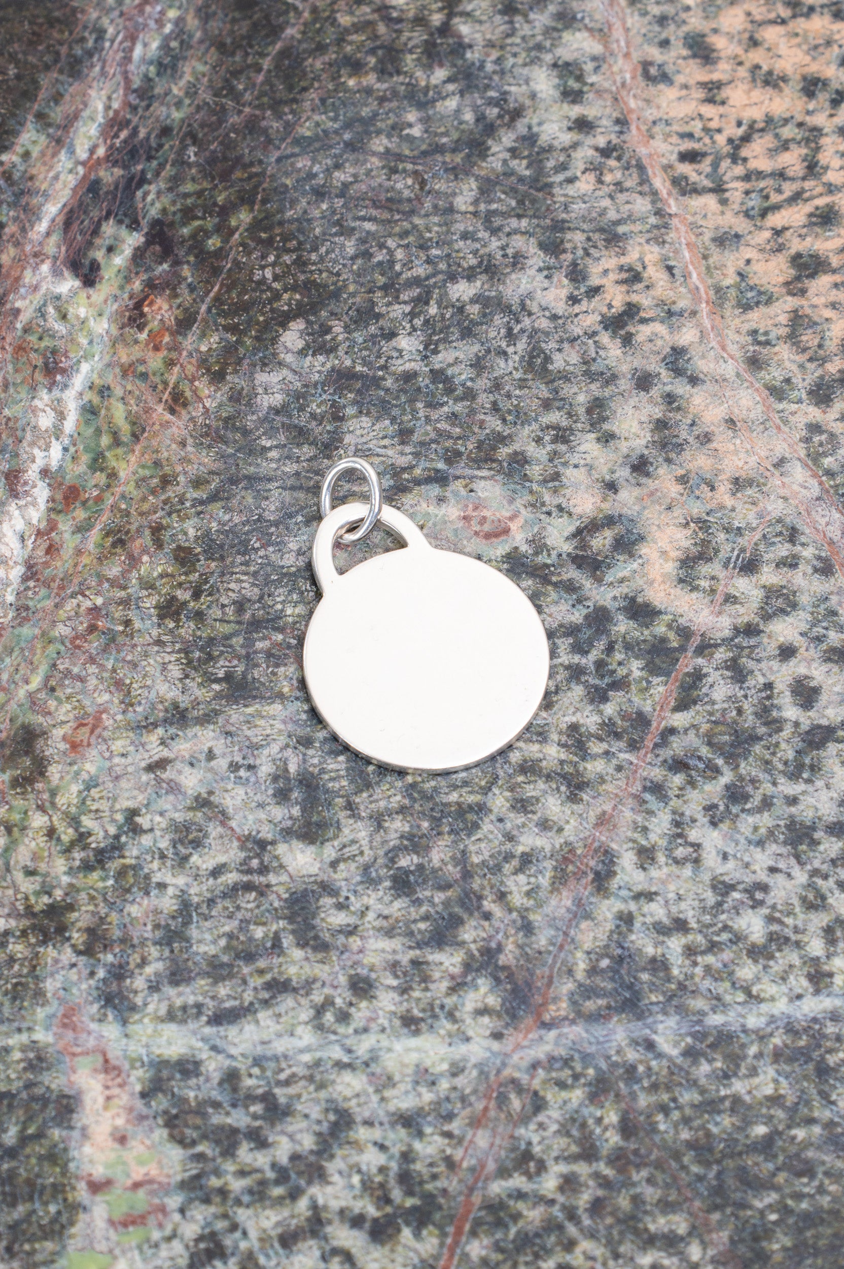 Back view of Tiffany & Co. Return to Tiffany Round Tag Circle Charm