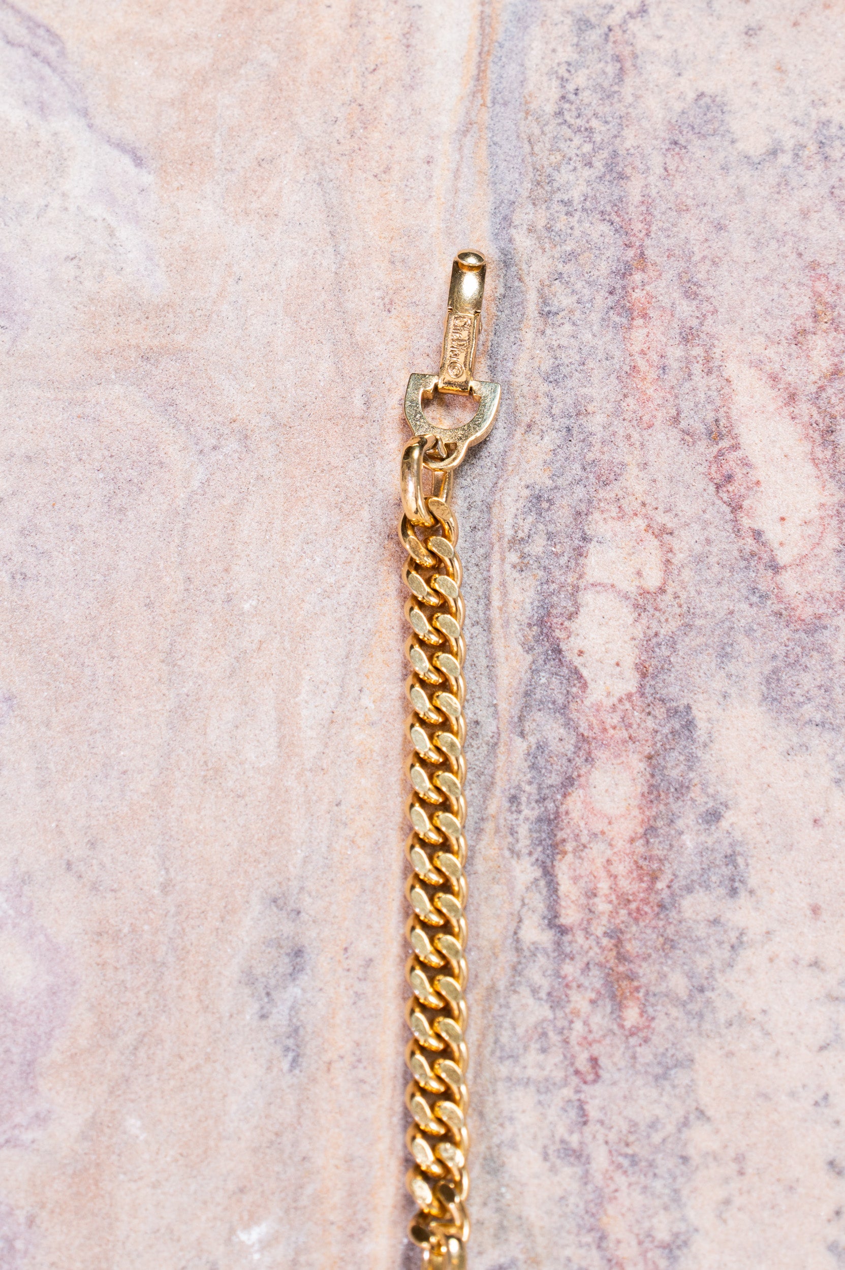 Another close-up view of Christian Dior Gold Crystal CD Chain Bracelet