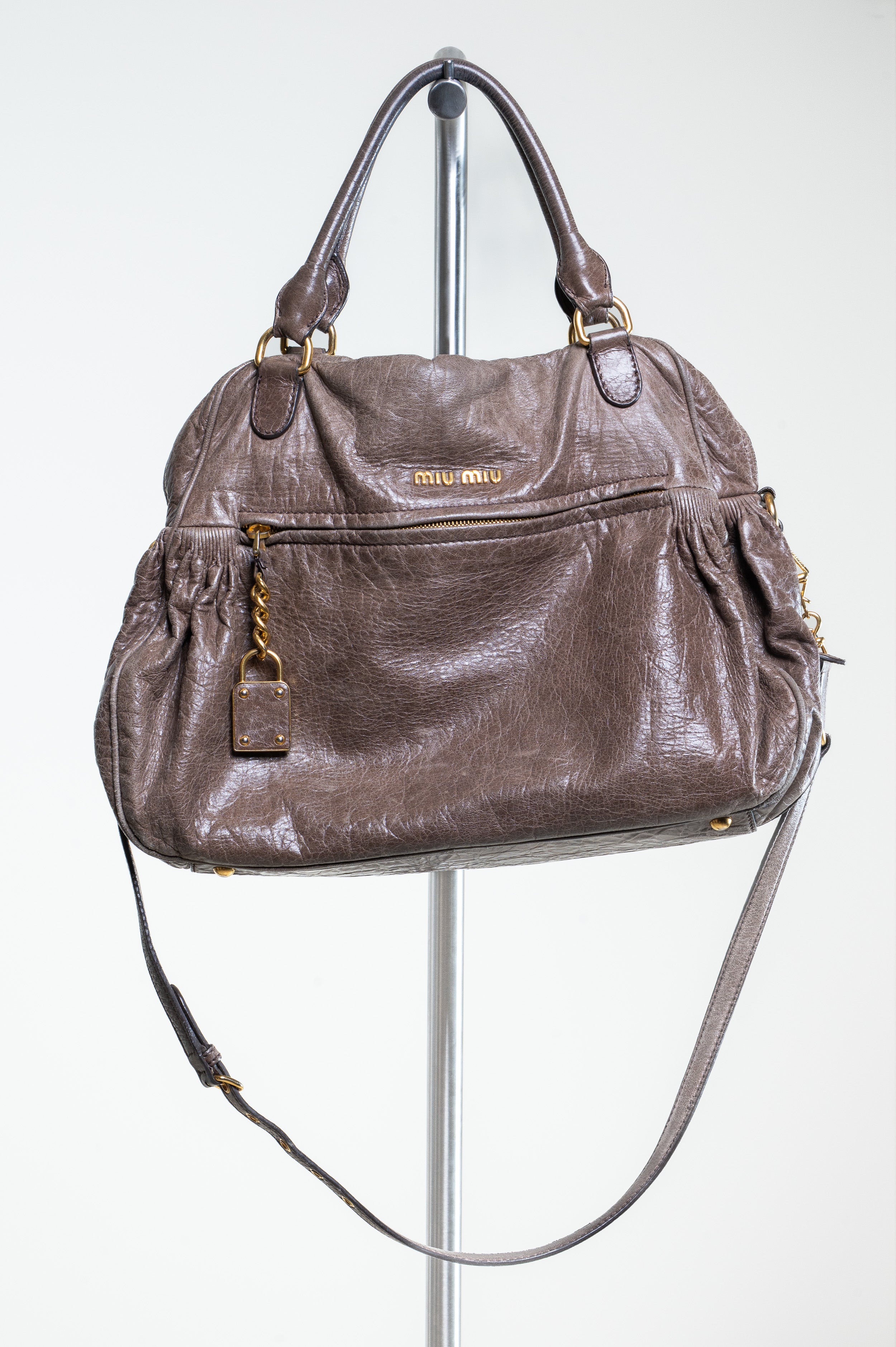 Front view of Miu Miu Brown Leather Gold Lock Bag